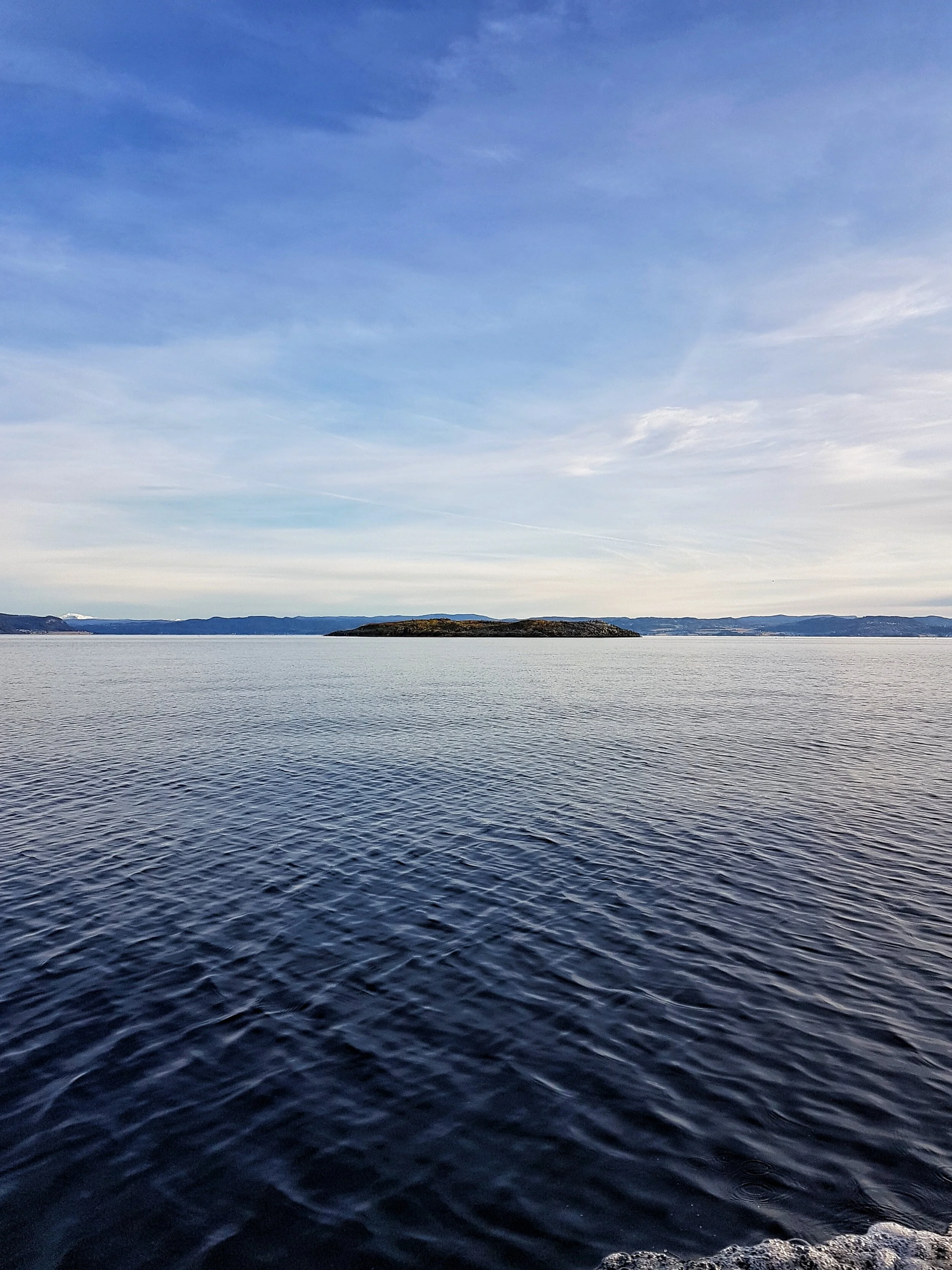 bluesky fjord horizon portrait island.jpeg
