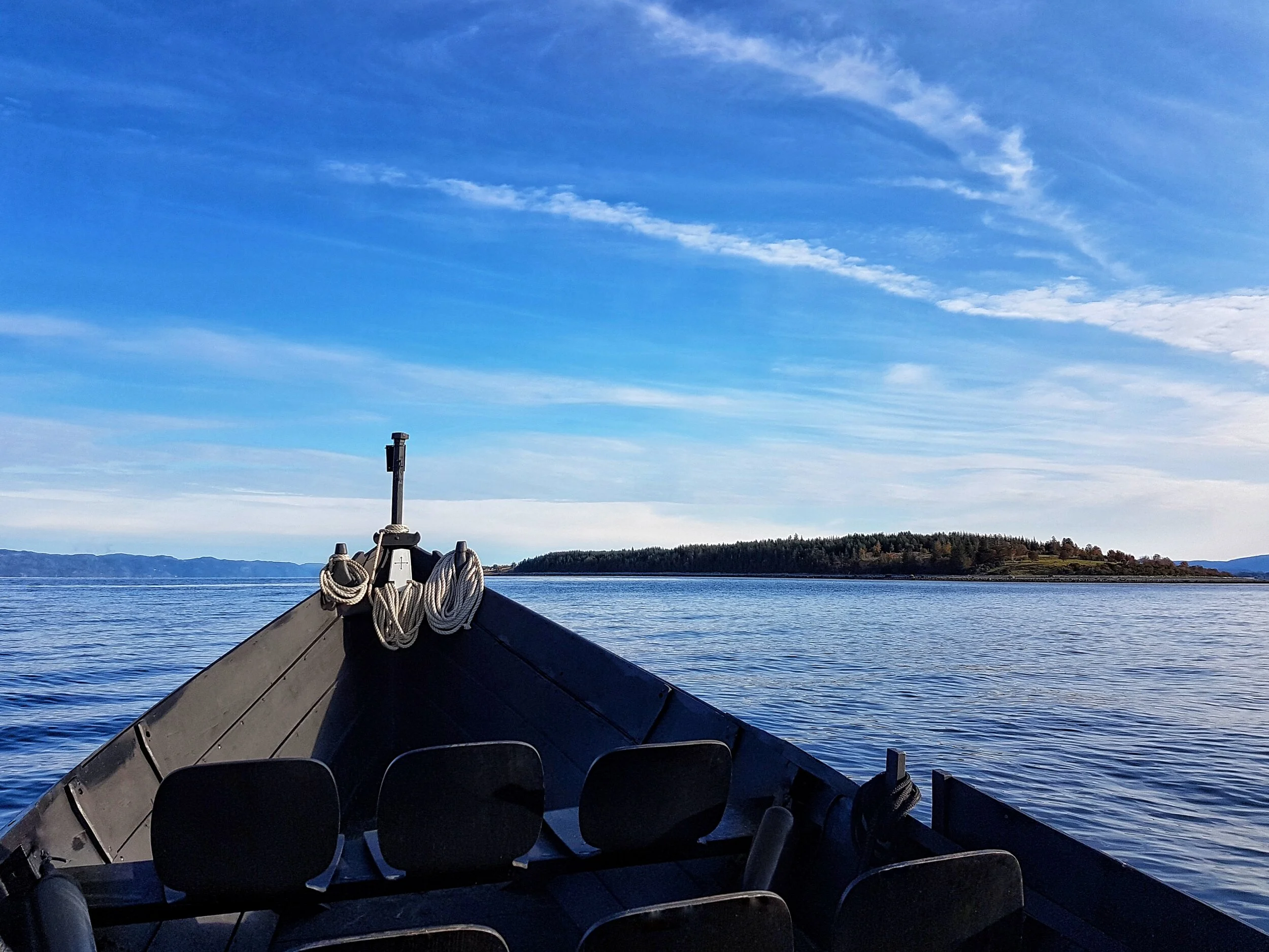 frøya fjord bluesky empty approaching tautra.jpeg