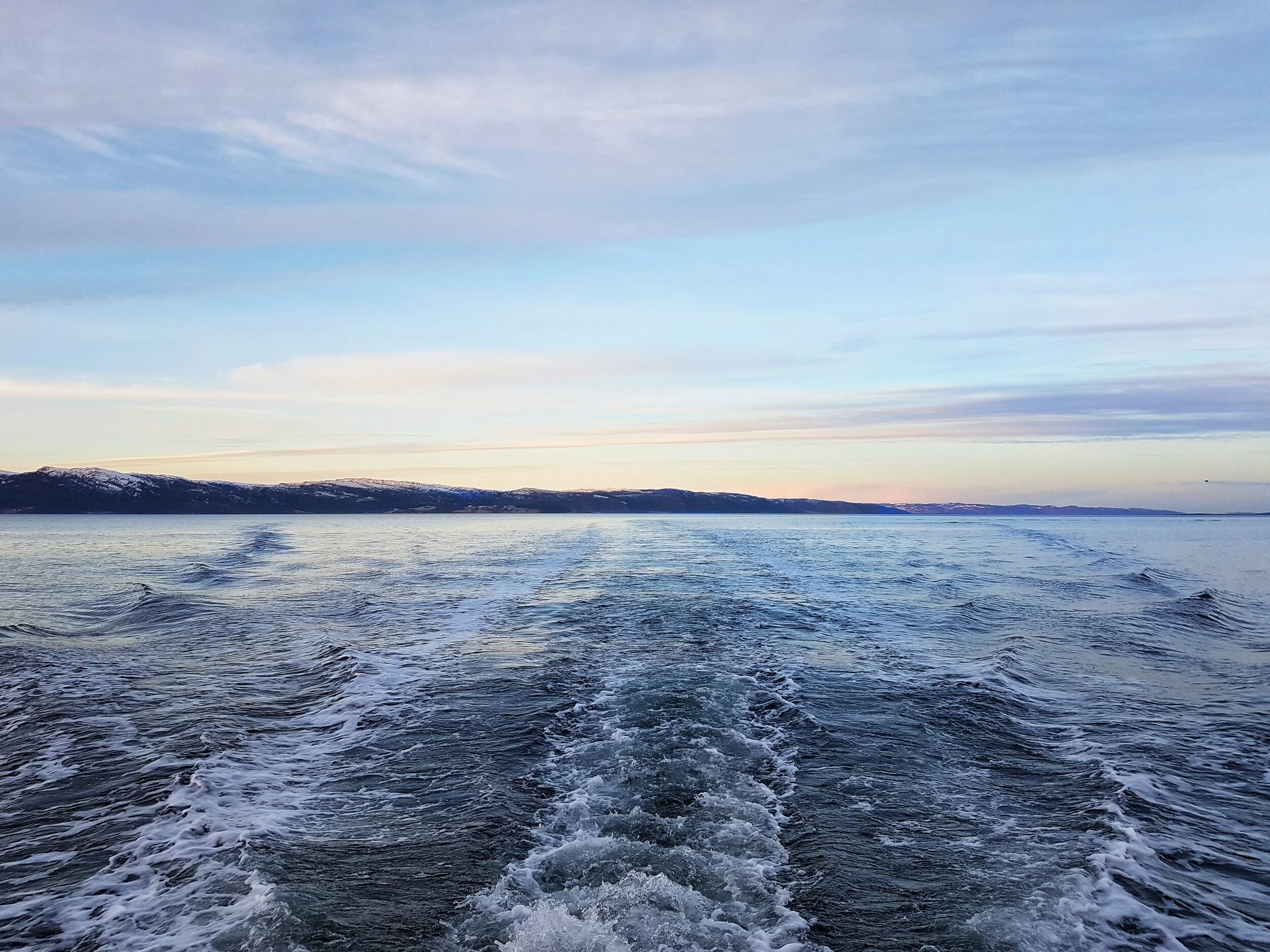 waves behind ranja fjord sunset.jpeg