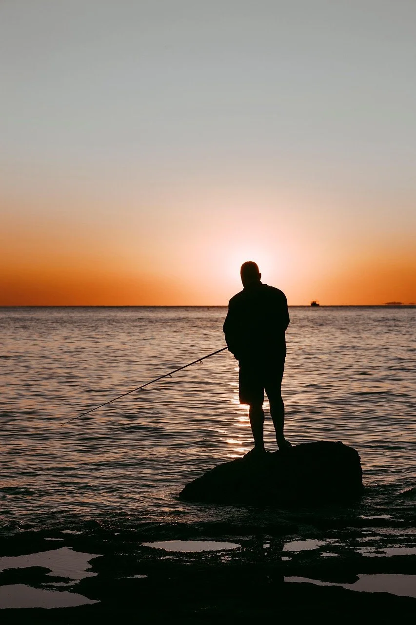 mann fiske solnedgang.jpg
