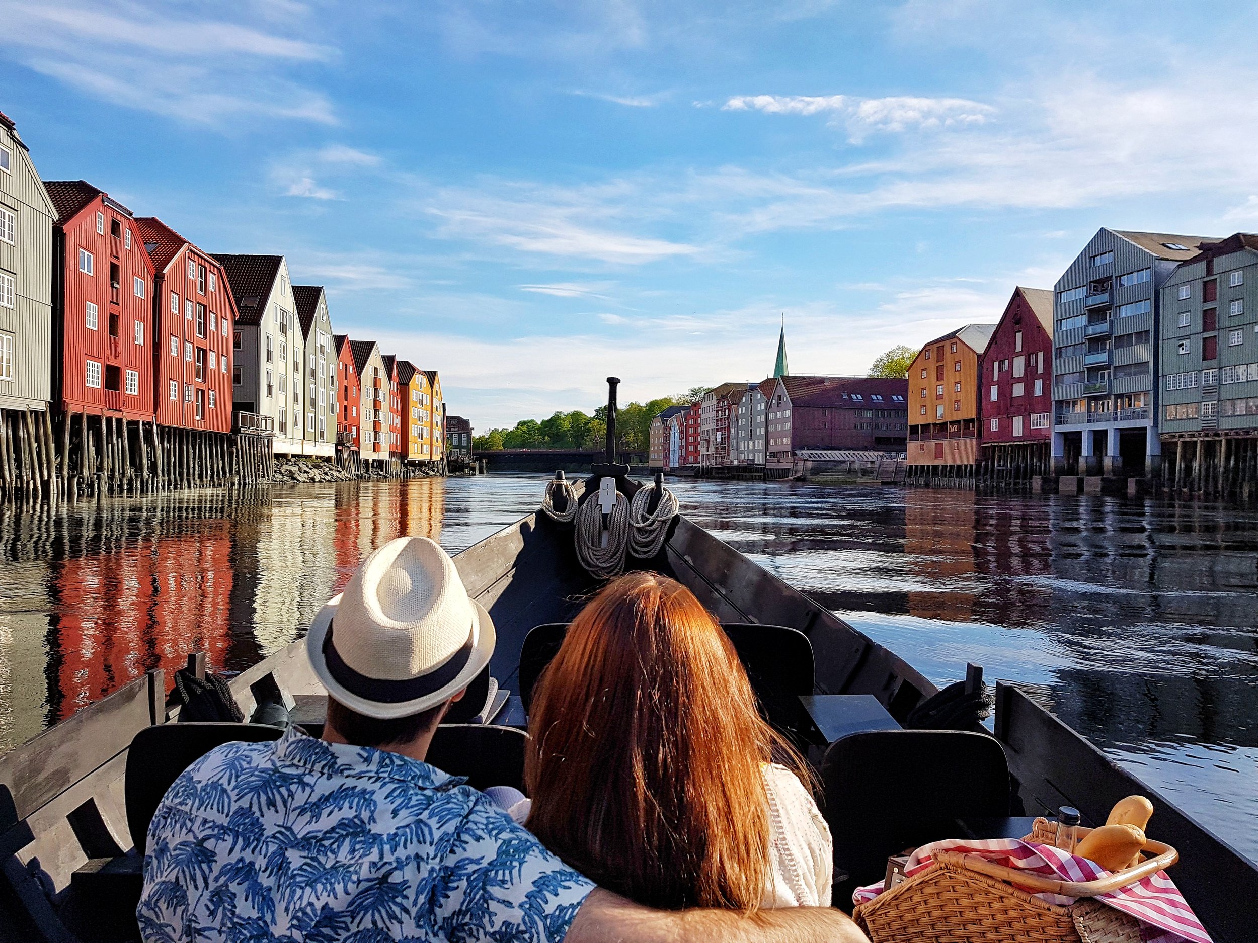 Copy of romantic couple frøya river houses reflections picknick basket blue sky.jpeg