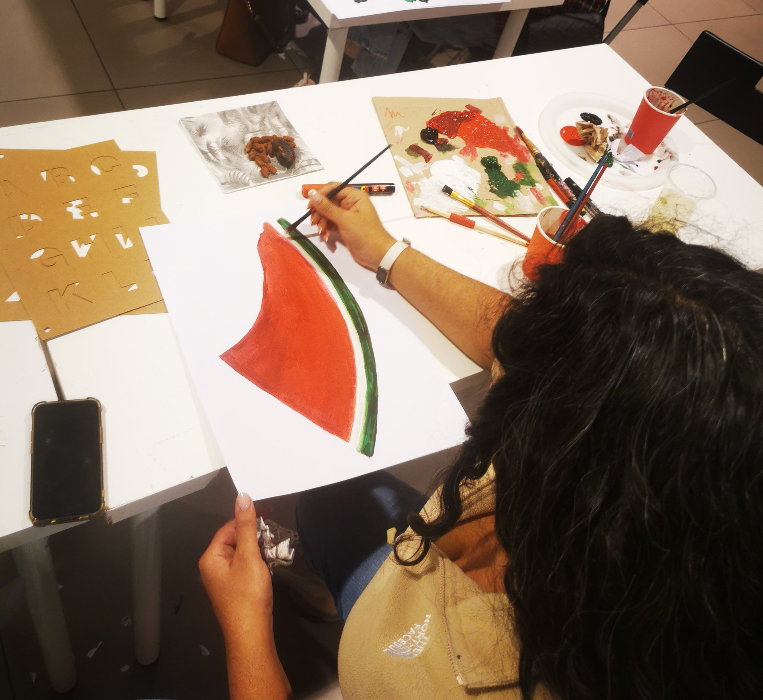  Poster making workshop in support for the freedom of Palestine at the Migration Museum. The workshop was open to all ages and mediums used included drawing, painting and collaging. 