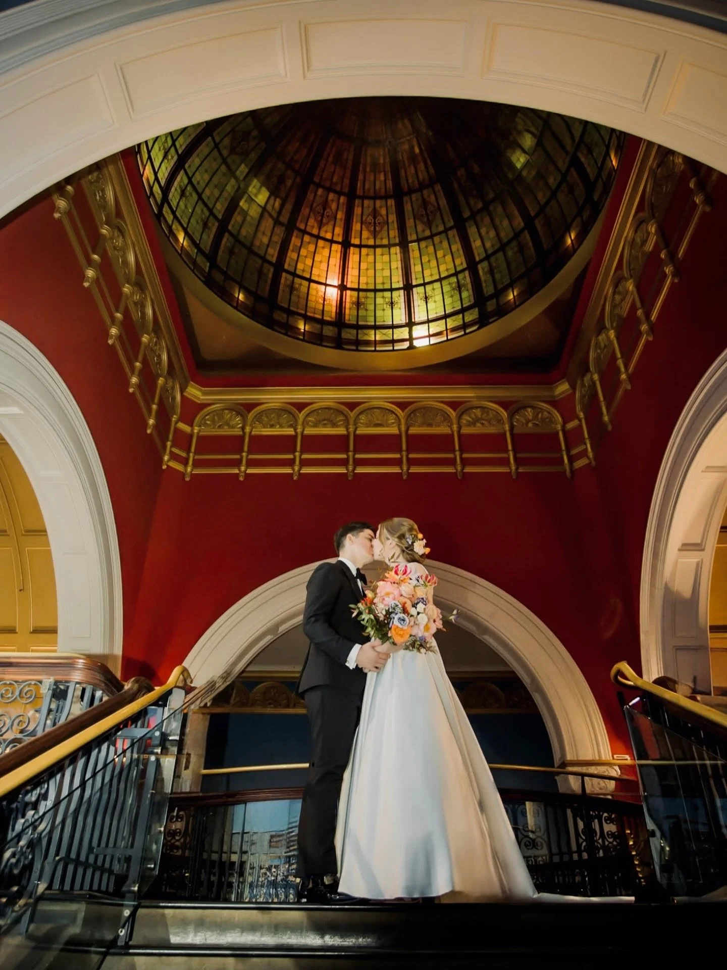 The Tea Room QVB is pure elegance from every angle. Nestled inside the Queen Victoria Building, it’s a wedding venue that combines historic charm with timeless grandeur. From the sweeping staircase to the ornate ceilings, every corner creates a