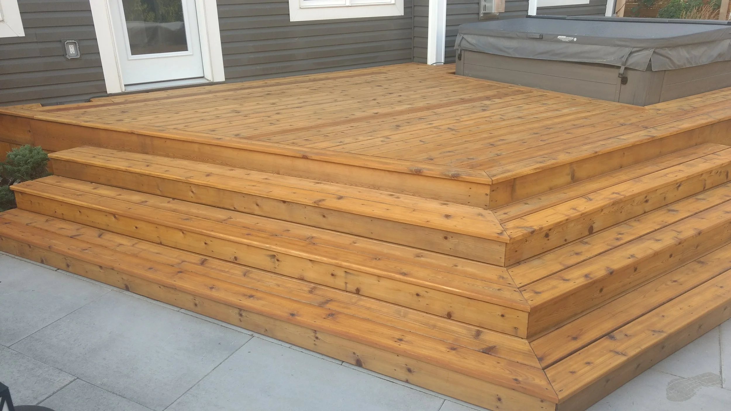AFTER - freshly stained cedar deck penetrating oil sealer.jpg