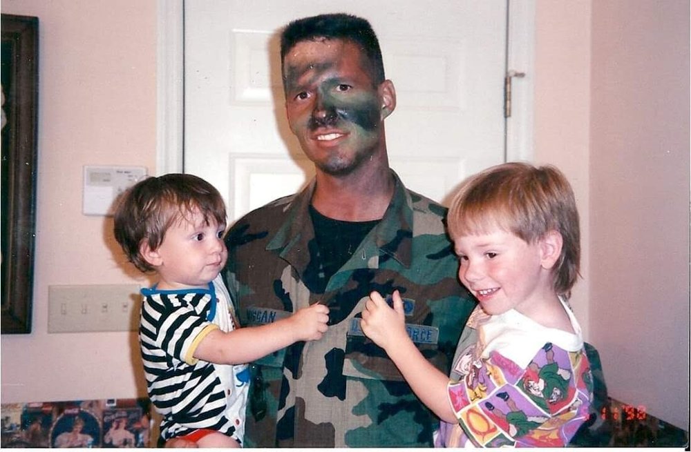 With two of his sons before deployment