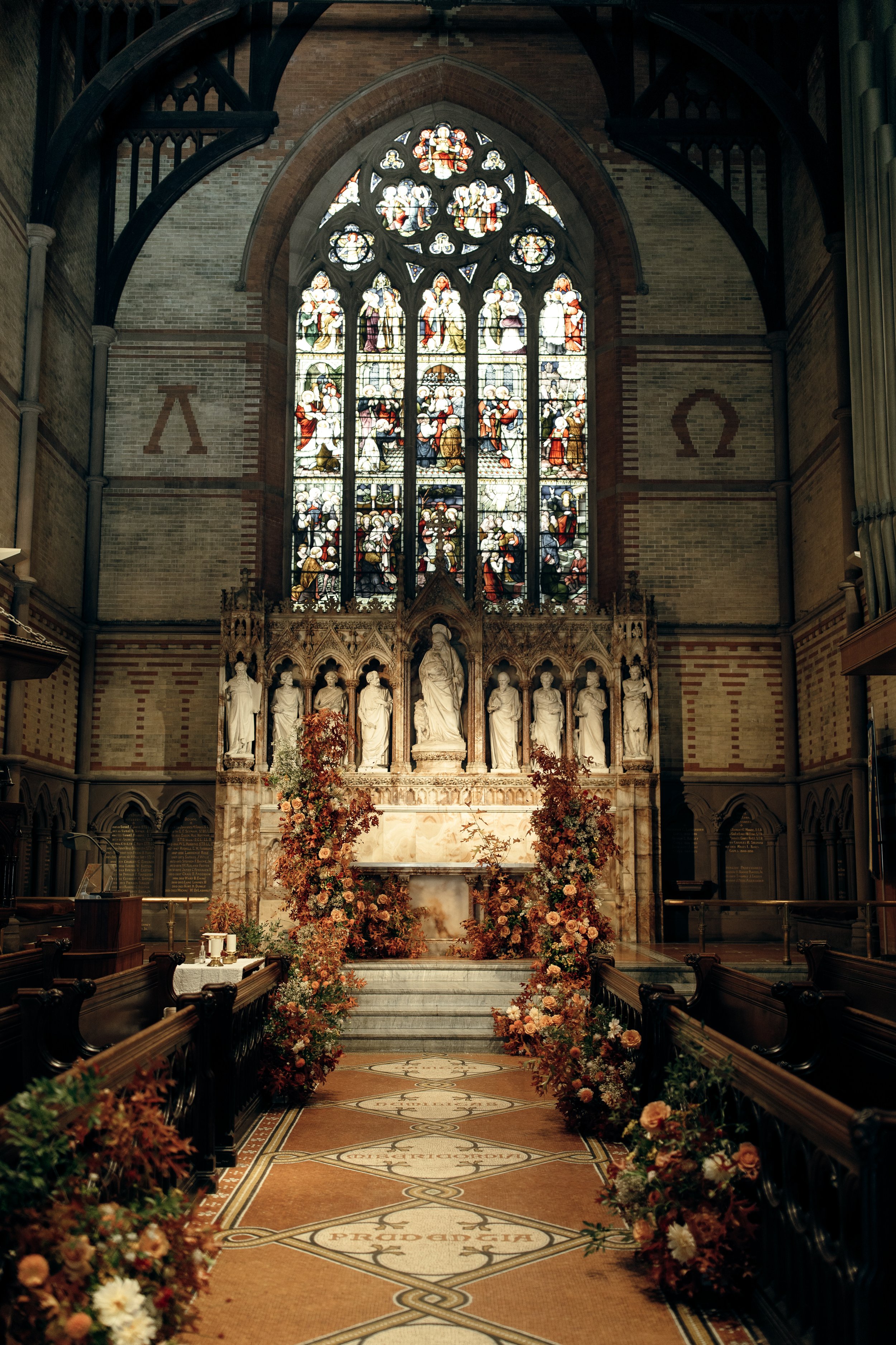 Autumn Renaissance inspired New York City wedding flowers. Burgundy and brown autumn flowers. 