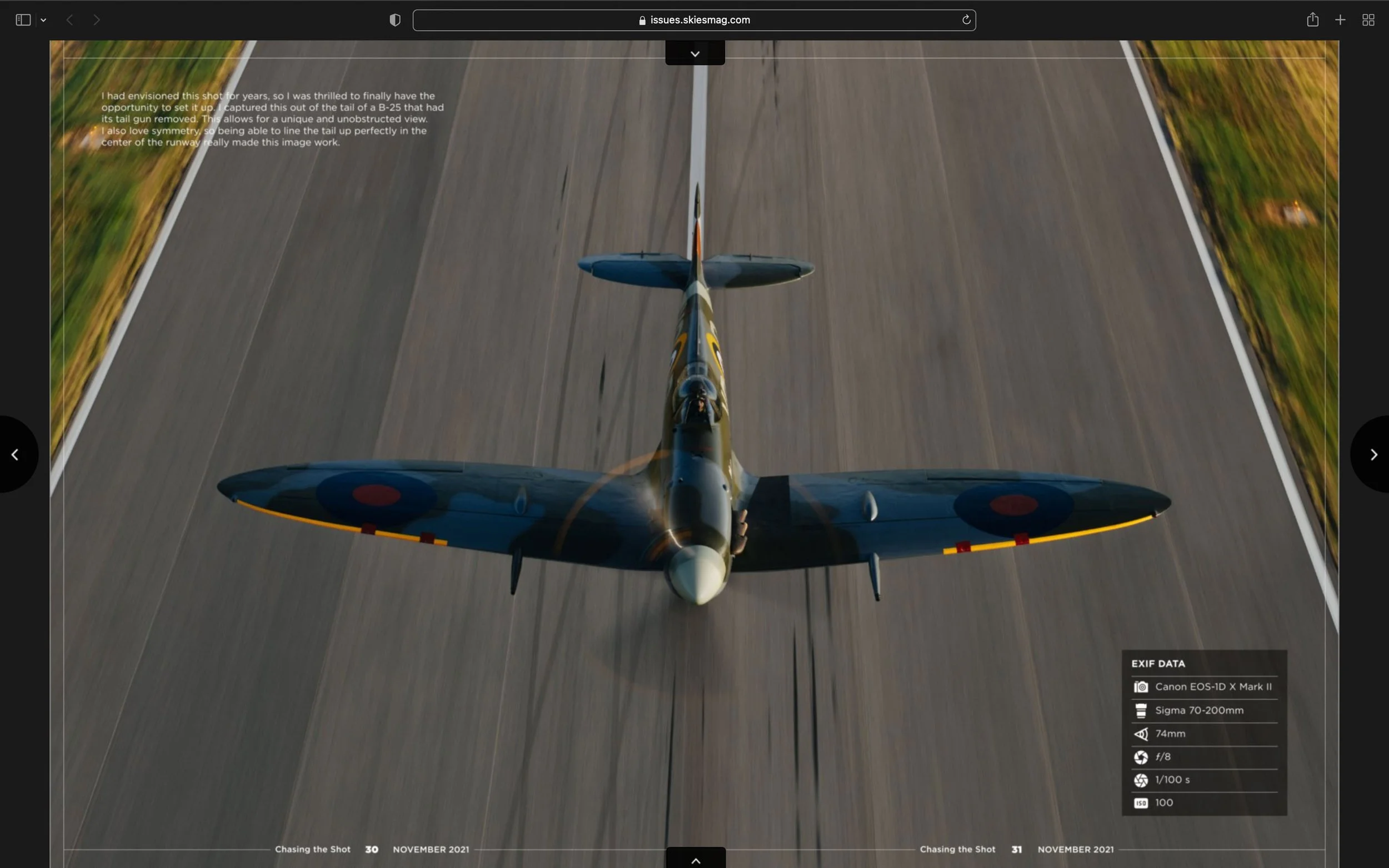 Aerial view of a vintage military aircraft flying over a runway, showcasing its symmetrical wing and tail design with circular insignia. The surrounding runway is blurred, emphasizing speed and motion.