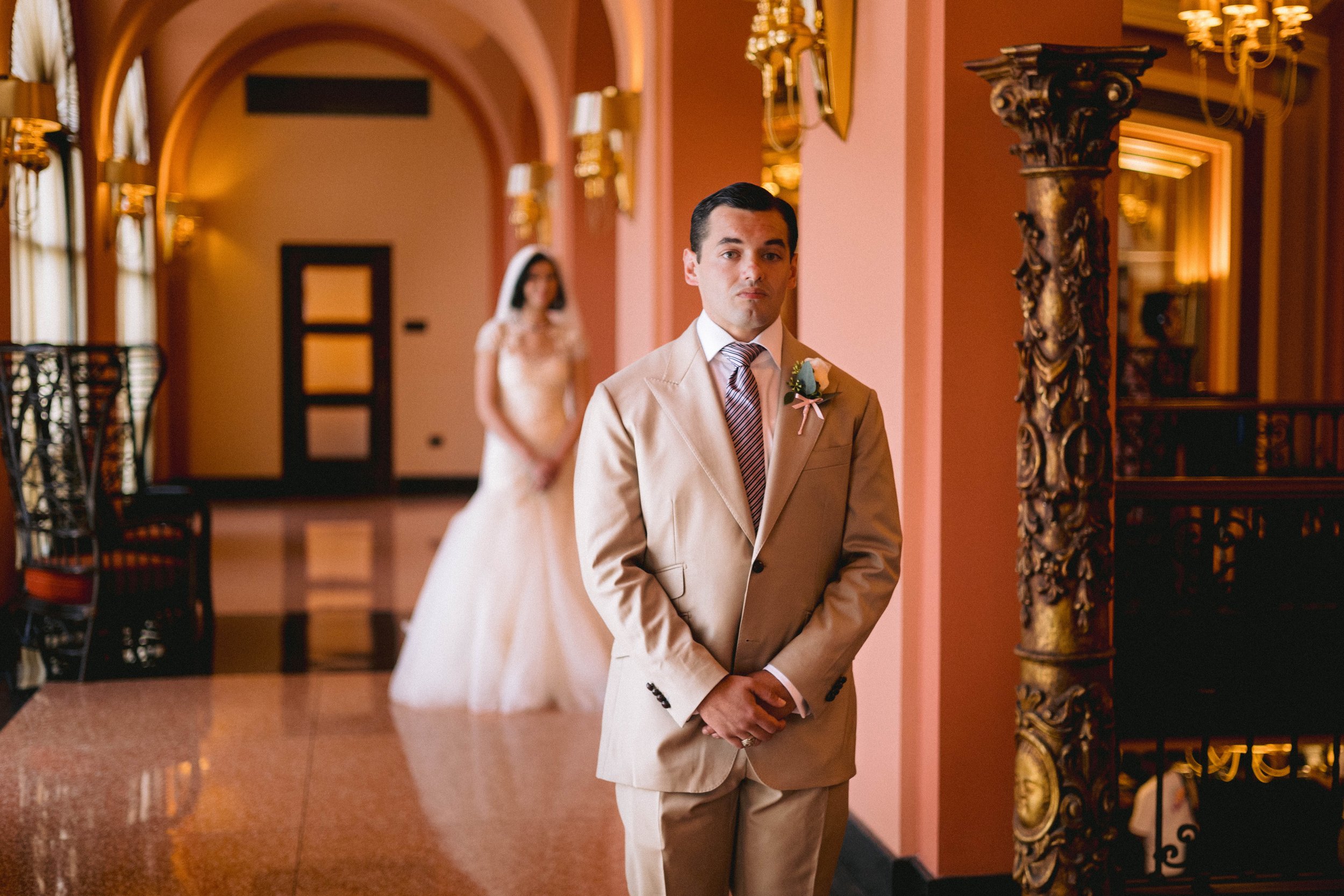 A Bride and Groom at their first look in the Condado Vanderbilt Hotel