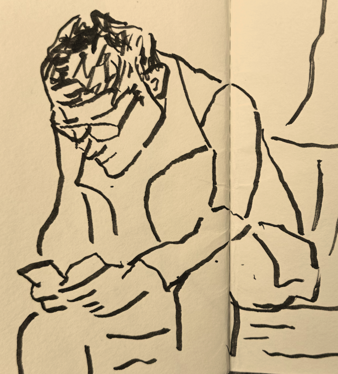 Sketch of a man sitting and looking at his phone in a quiet moment