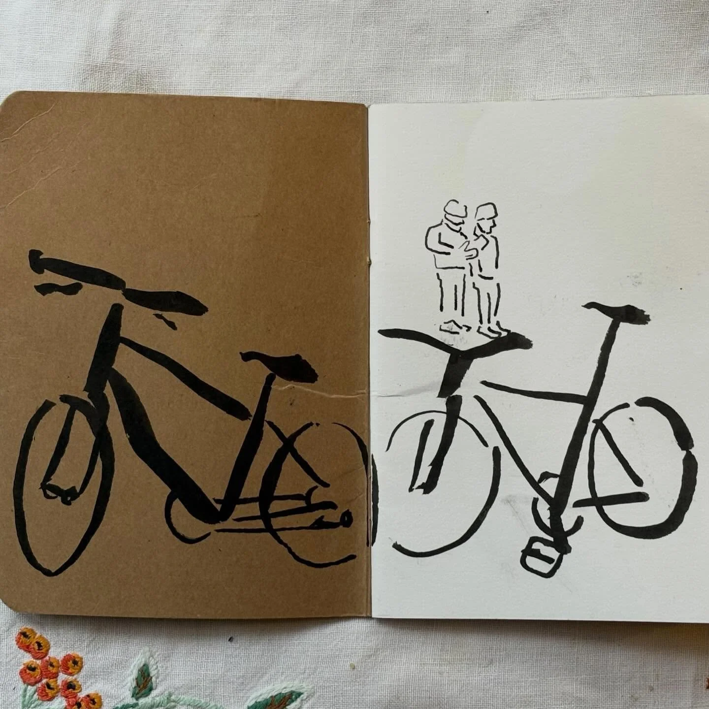 Bikes opposite and two figures at the bus stop, coffee @georgescafebrockley ☕️✏️🚲
.
#walktosee
#goodshipillo
#georgescafebrockley
#urbansketch
#everydaymoments