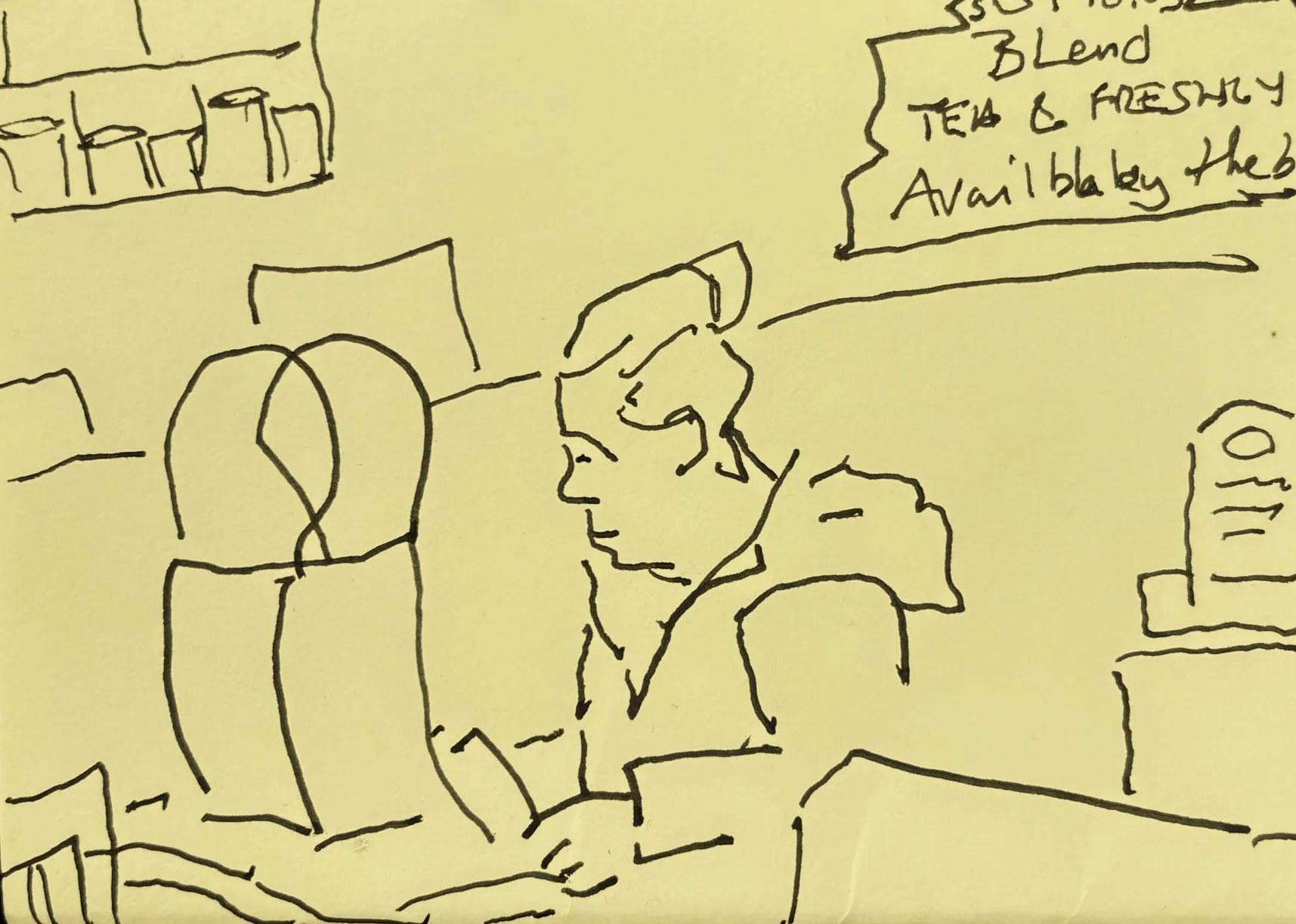 People sitting in a café interior, reflecting everyday moments and seasonal change