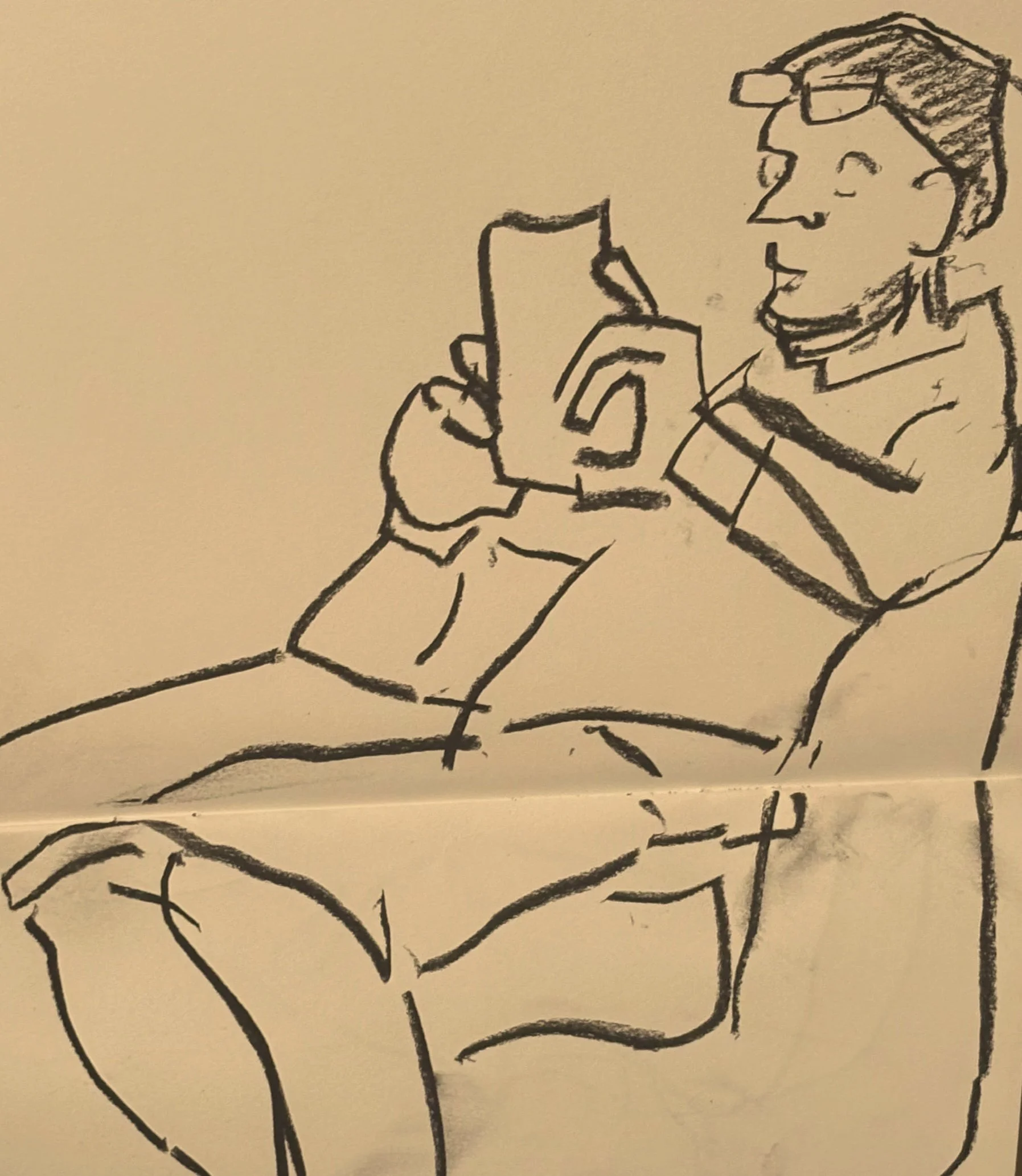Sketch of a seated figure reading or holding a piece of paper, relaxed but attentive.