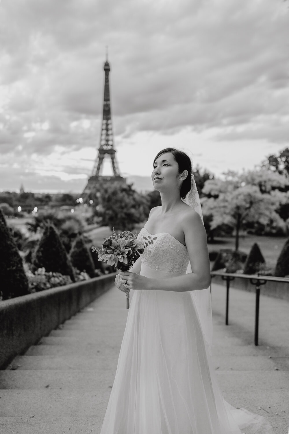 Bridal shoot in Paris France by the Eiffel Tower view stairs