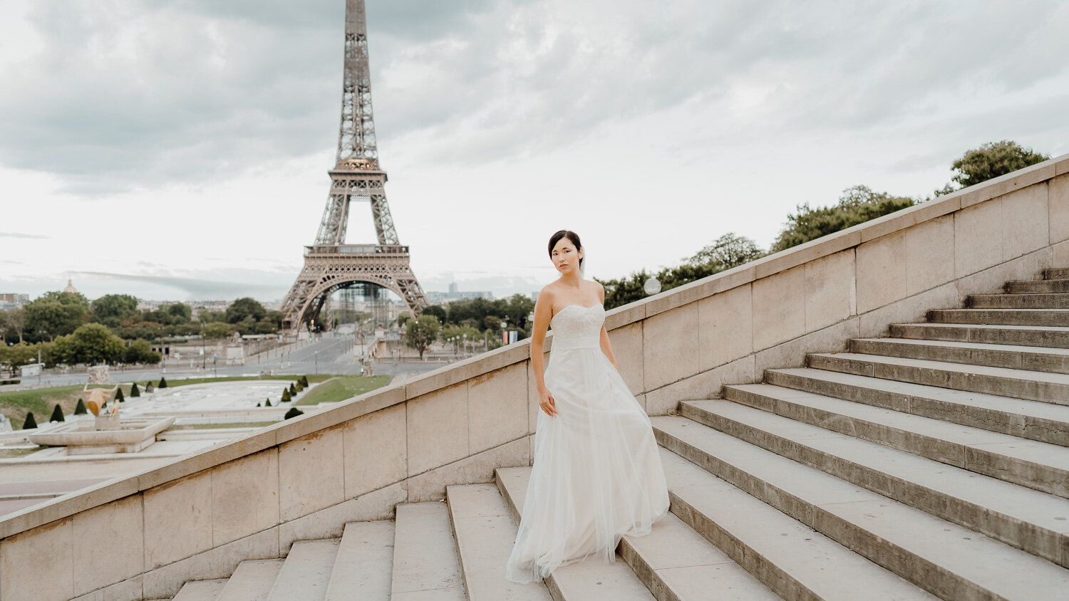 Bridal shoot in Paris France by the Eiffel Tower view stairs