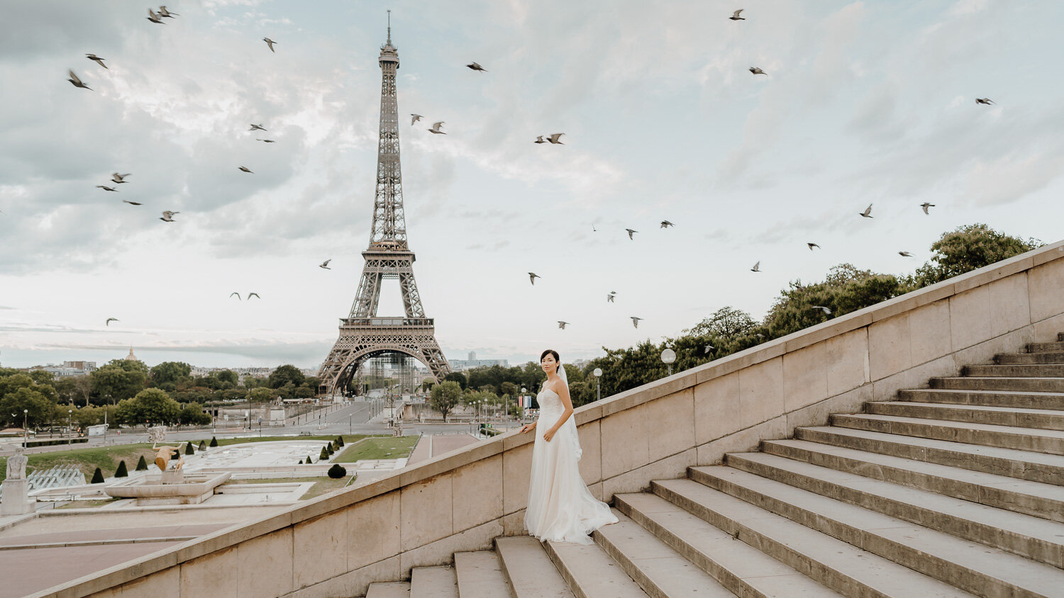 Bridal shoot in Paris France by the Eiffel Tower view stairs