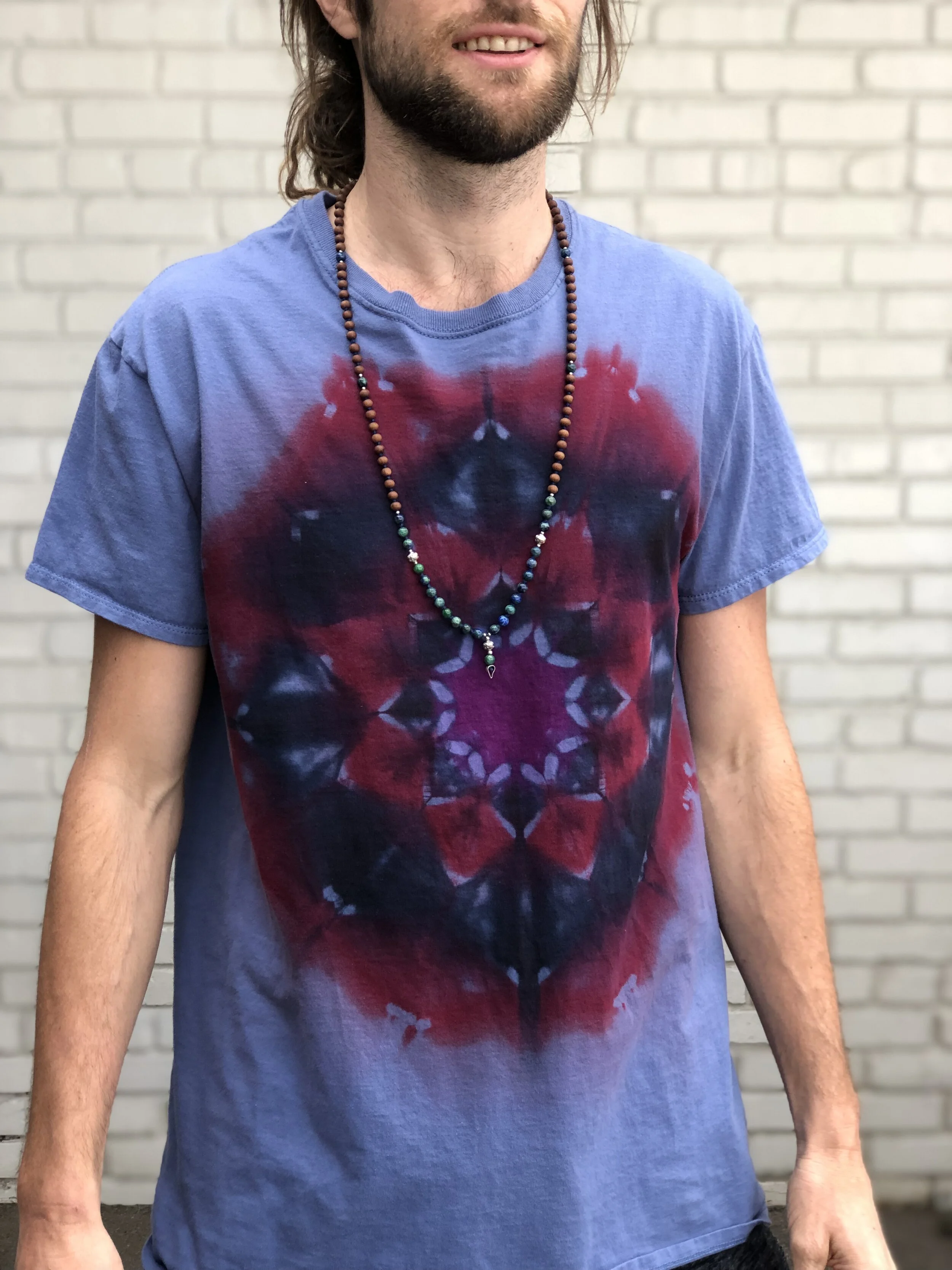 No dye on the background, shirt was already blue. 