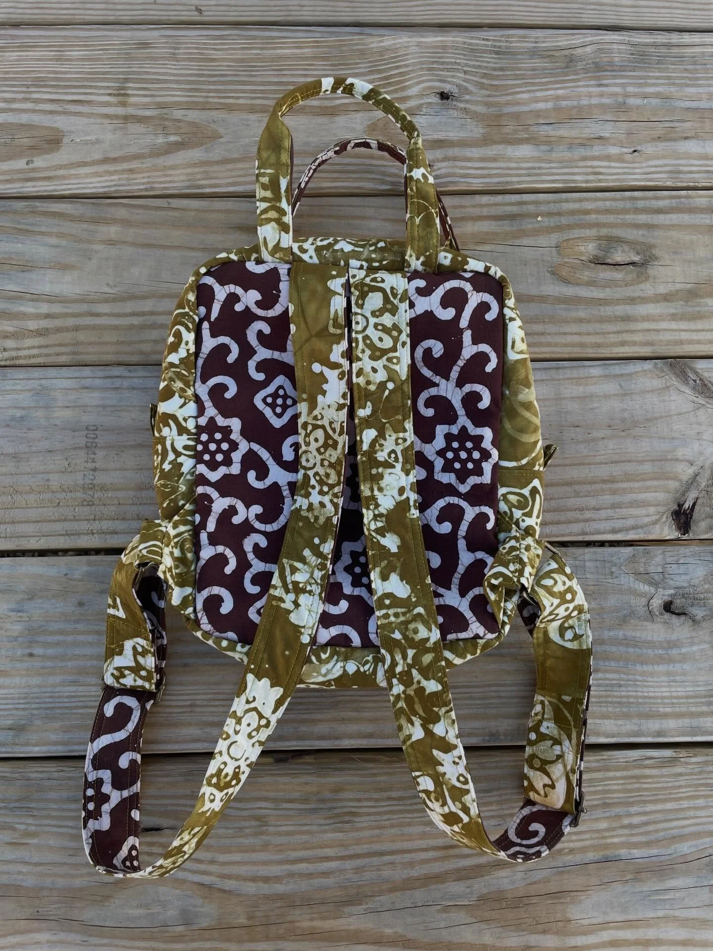 #igquiltfest2026 Day 6: Quilty Fashion

This day is gonna be full of incredible clothing for most folks (and I cannot WAIT to see), but honestly, the first thing that came to mind for me is this small backpack that is now my knitting project on-the-g