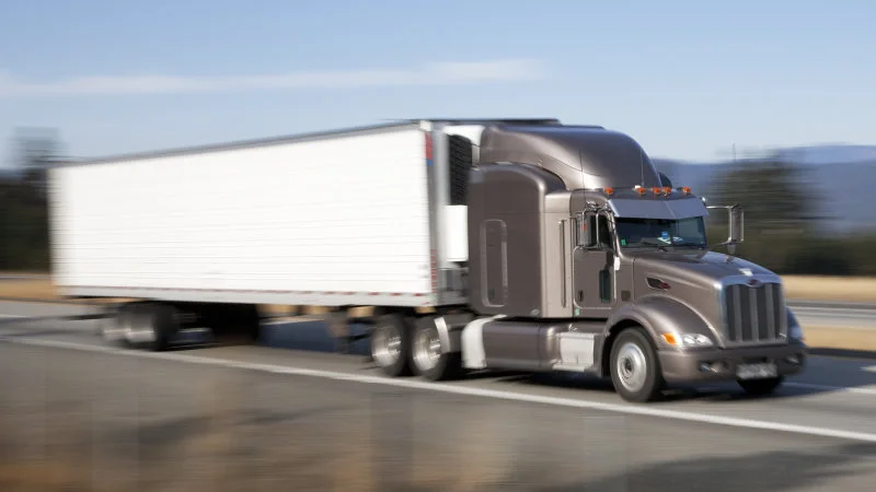 truck-on-the-highway-picture-id155143646.jpg