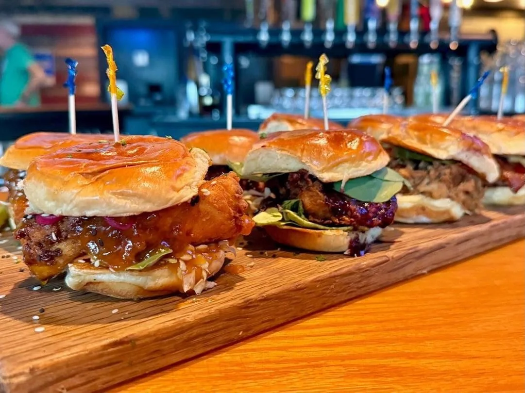 Big game, even bigger bites. Come catch the NCAA Championship gave with Slam Dunk Sliders! 🍻