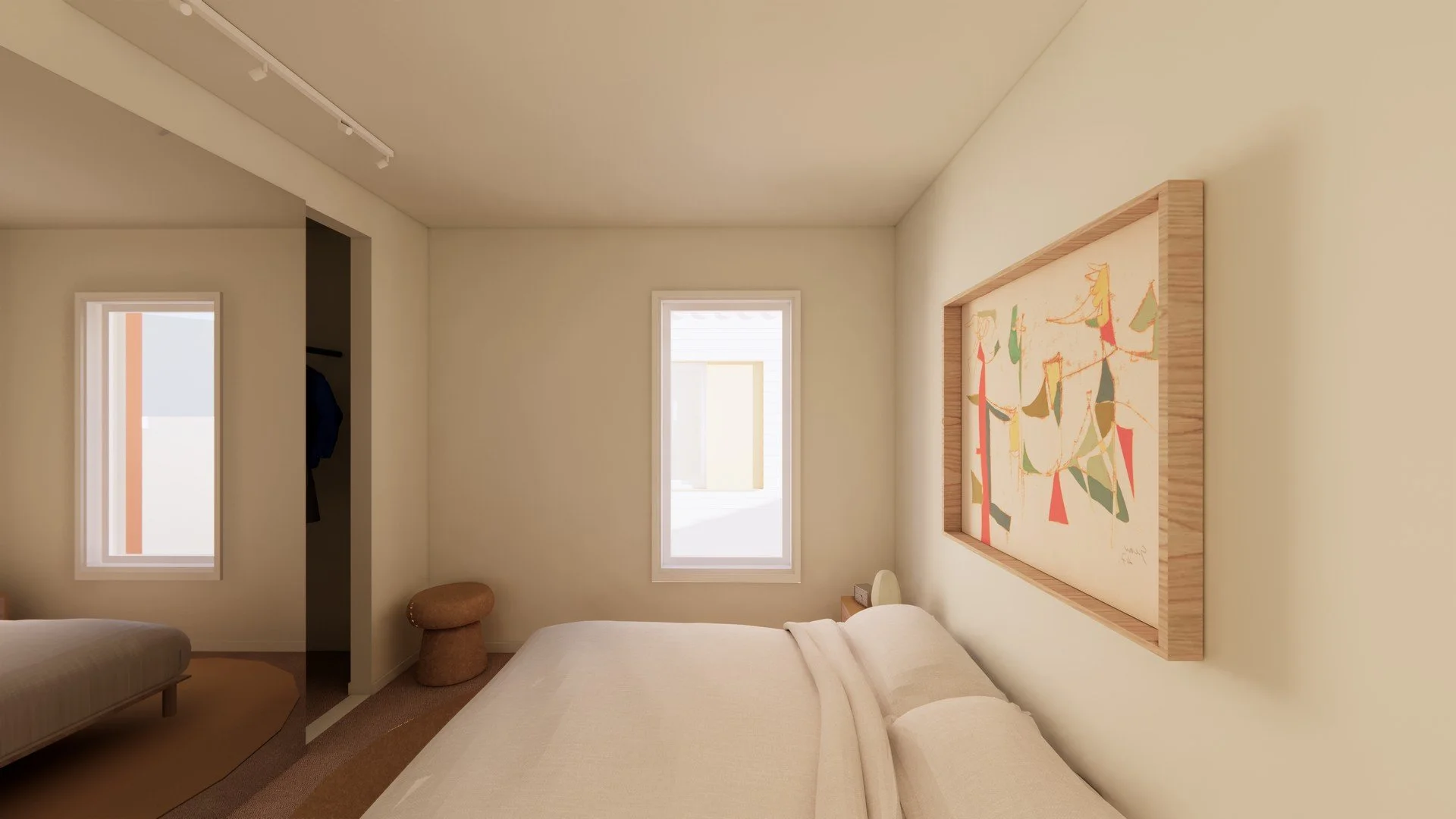 A bedroom with beige walls, two narrow windows, a bed with cream-colored bedding, a small wooden stool, and a framed abstract artwork on the wall.
