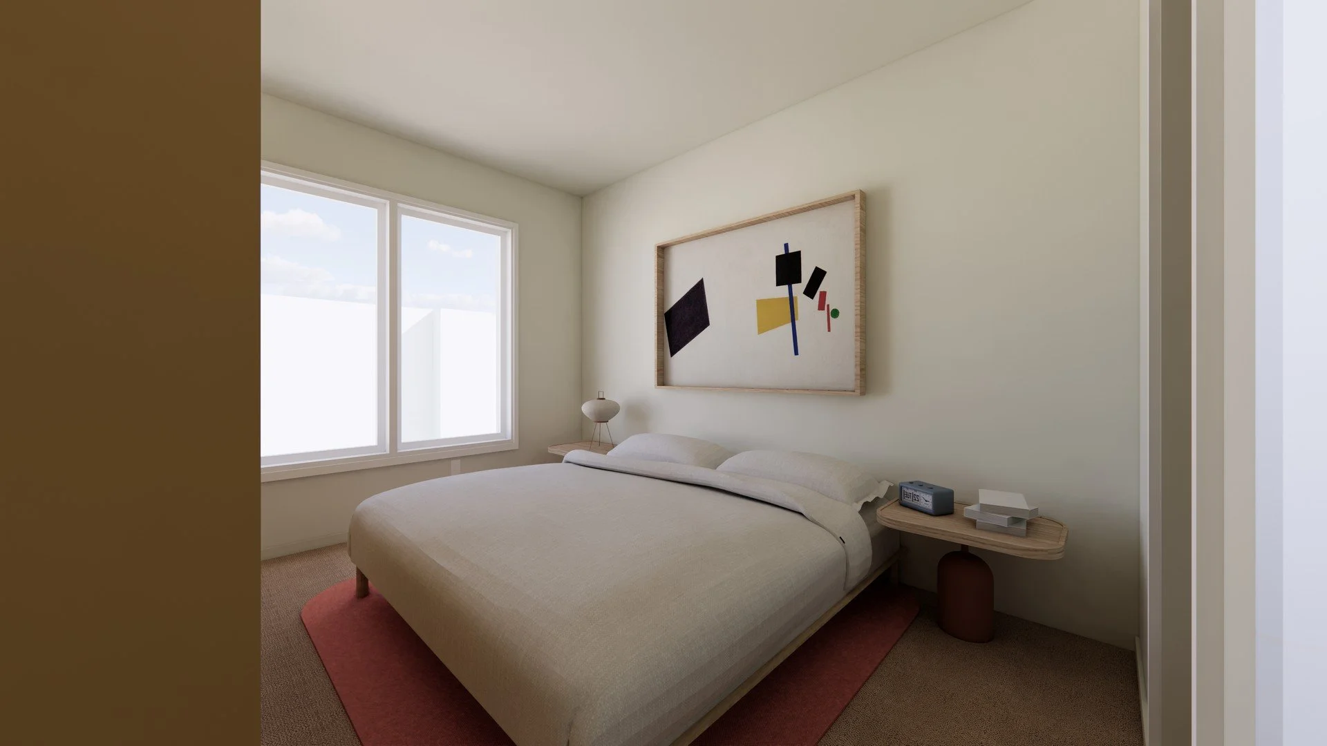 Modern bedroom with a beige bed, abstract artwork on the wall, bedside table with books and clock, window with sky view.
