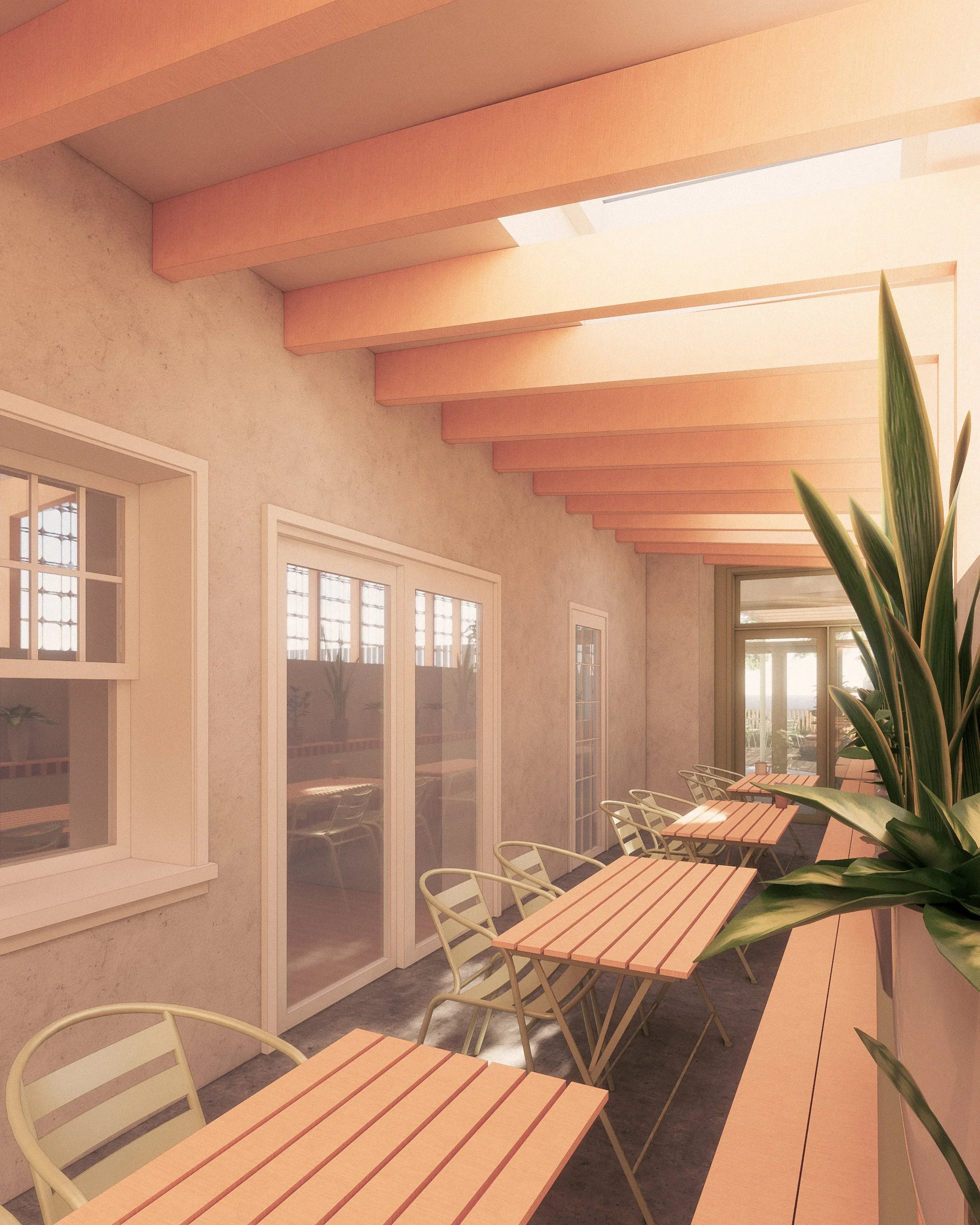 Sunlit indoor patio with wooden tables and cream-colored chairs, potted plant on the right, windows and glass door in the background, ceiling beams, and a beige wall.