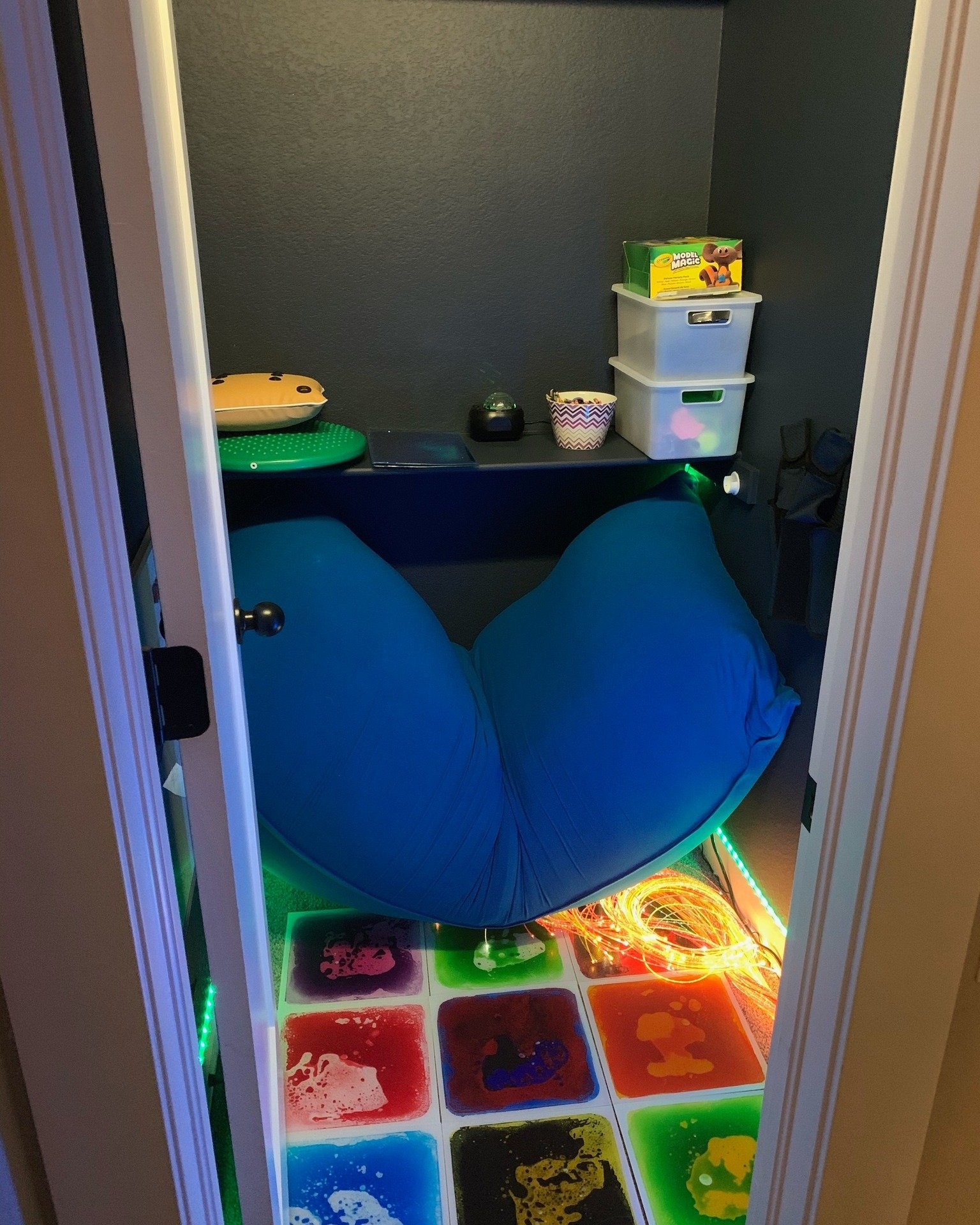 Who says closets are just for clothes? 

This closet was transformed into a sensory sanctuary with painted walls, a cozy bean bag chair, sensory tiles, and more - perfect for sensory regulation and relaxation. 

At SENSE-ational Spaces, we specialize