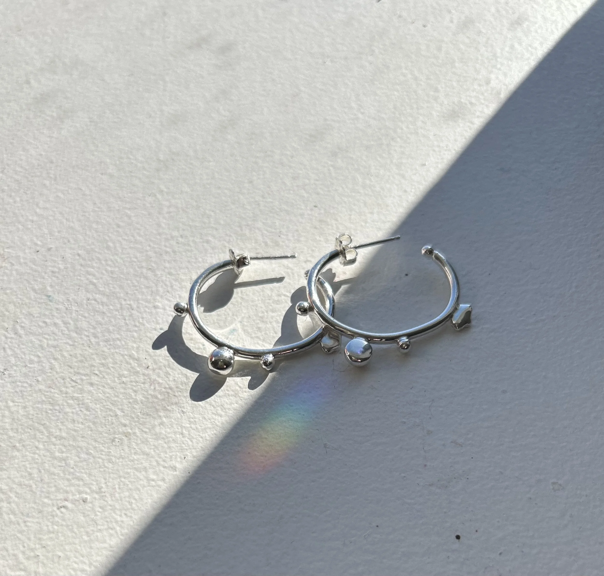 Morse Code Oval Hoops.png