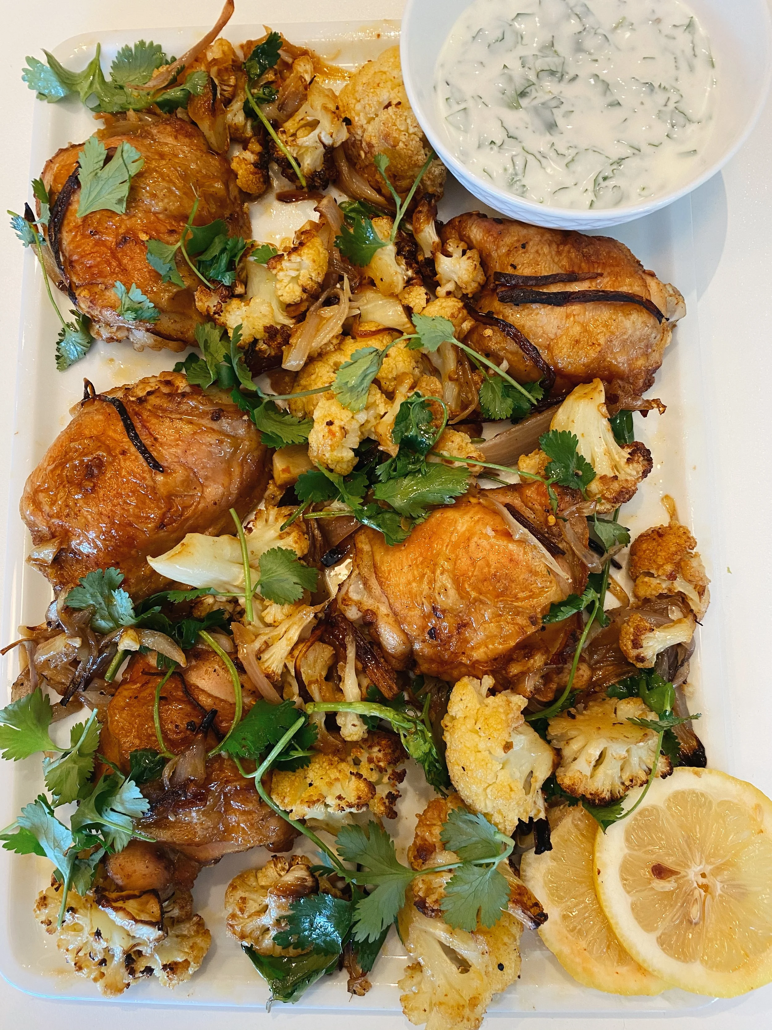 Roasted Chicken Thighs with Cauliflower and Herby Yogurt Dressing