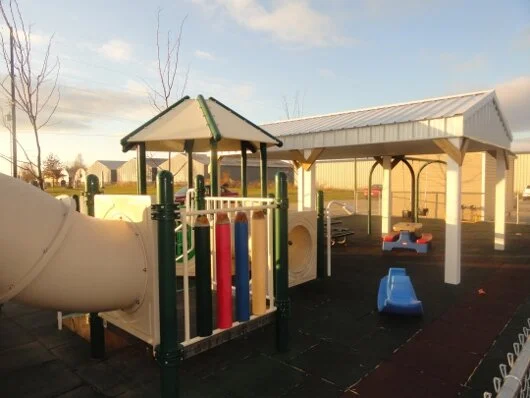 playground equipment near shelter cover