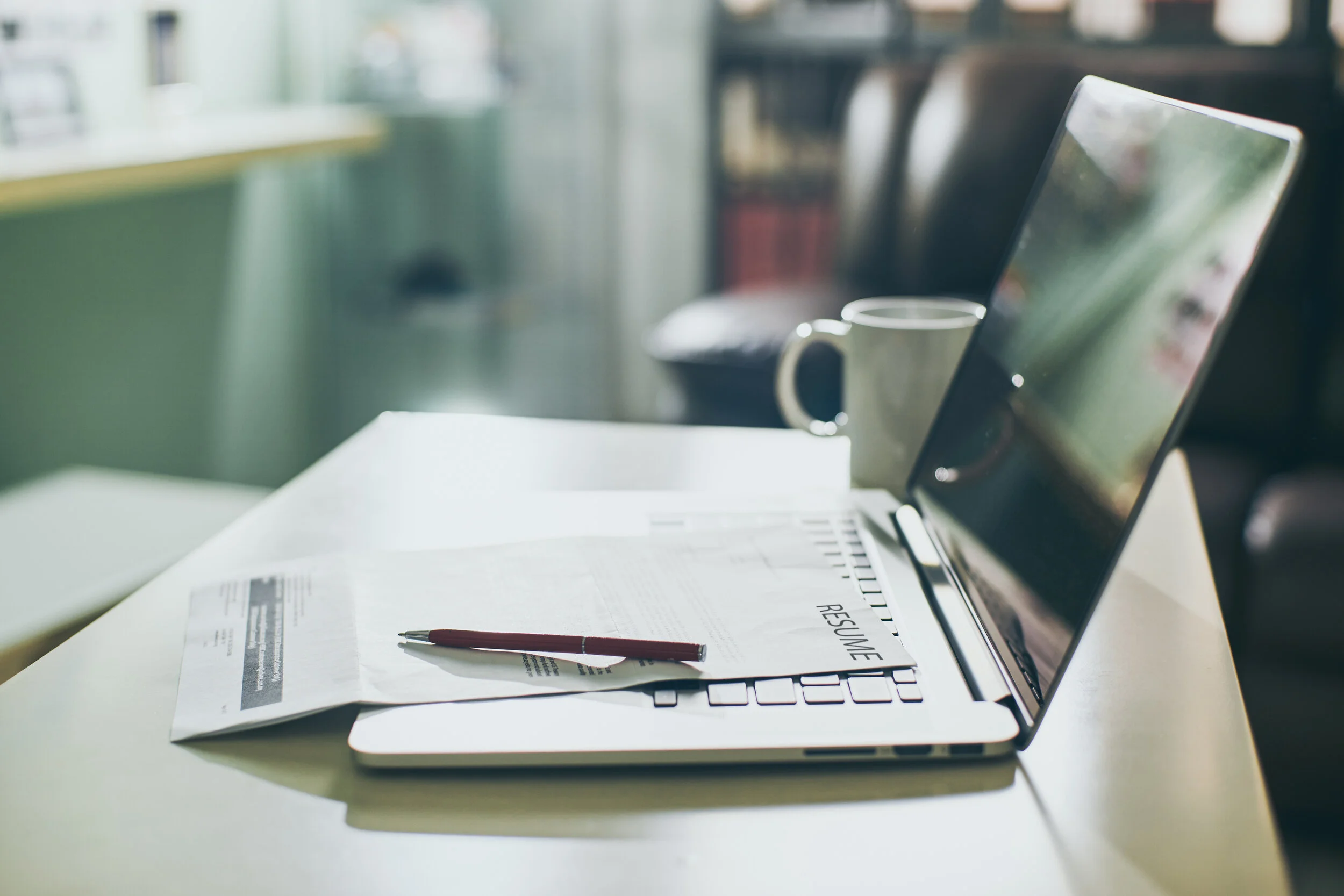 graphicstock-office-table-with-laptop-tablet-and-resume-information-job-search-concept_Sd4BU2wxsx.jpg