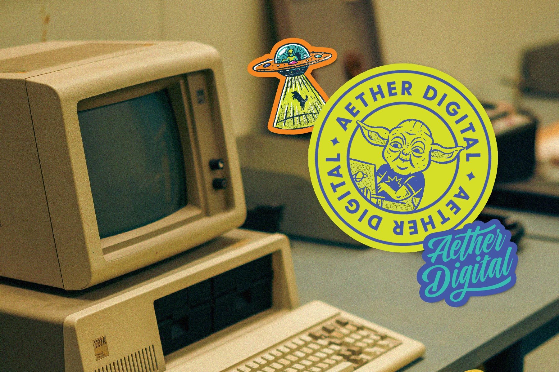 Retro computer with Aether Digital stickers