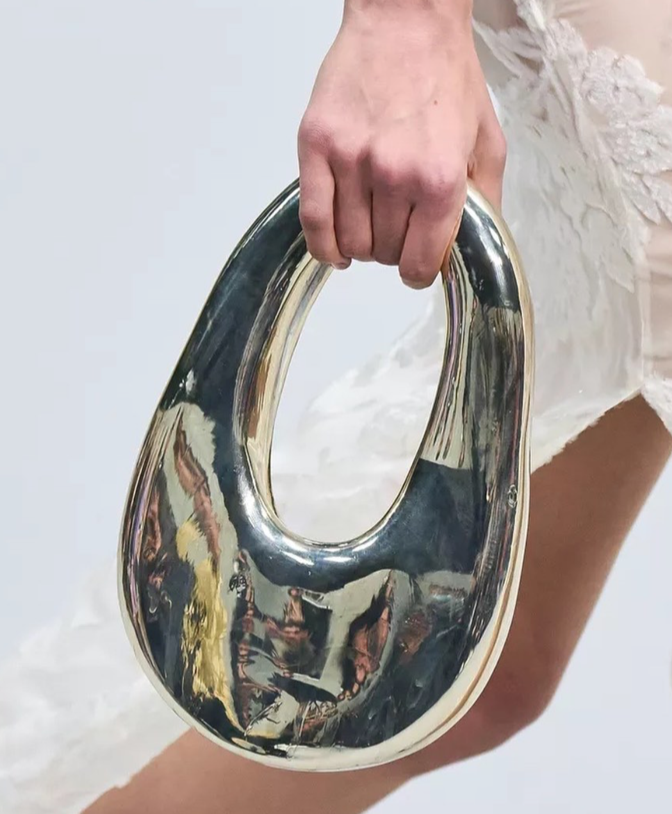 The Hype Behind the Coperni Glass Swipe Bag