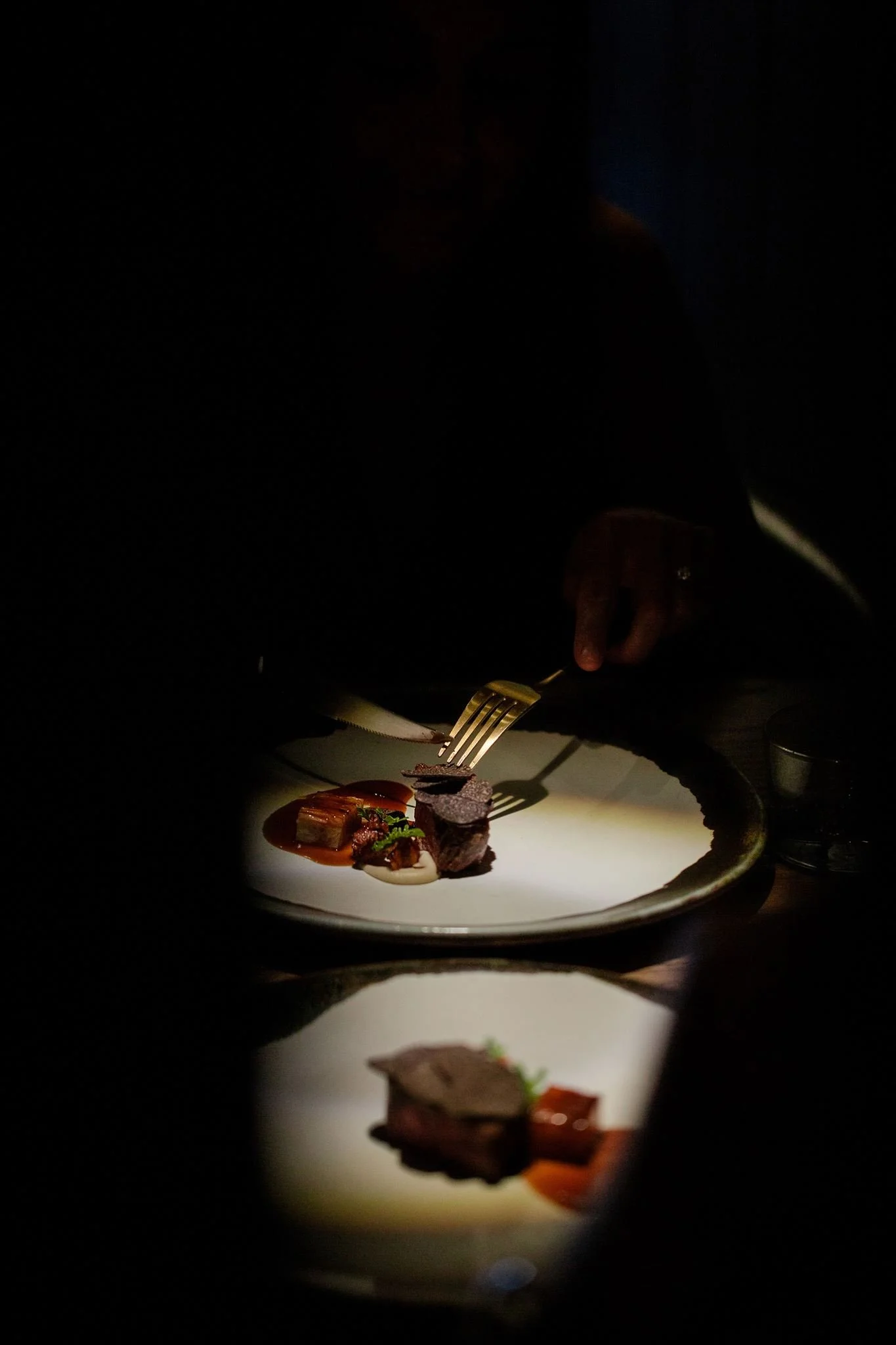 A plated meat course