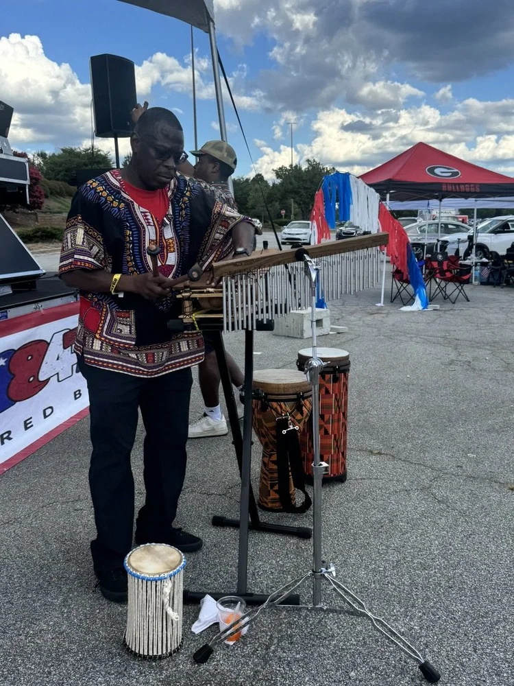 Percussion performance at a Liberian cultural celebration