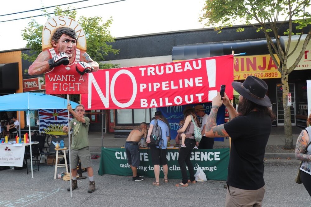 Figure 2. George Rammell and Justin Wants a Fight puppet at the Protest Against the Trans Mountain Pipeline expansion, 2018.