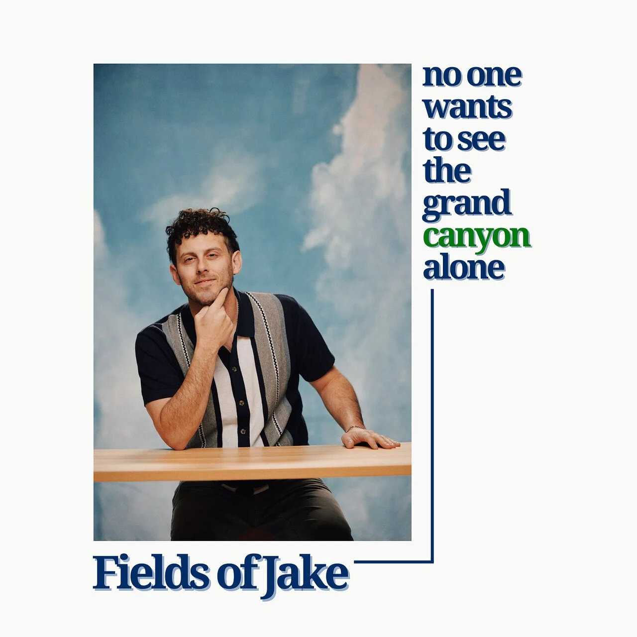 Album cover for "Fields of Jake" featuring a portrait of a man with curly hair, wearing a black and gray striped shirt, sitting at a wooden surface against a blue sky with clouds background. Text on the right reads: "no one wants to see the grand can