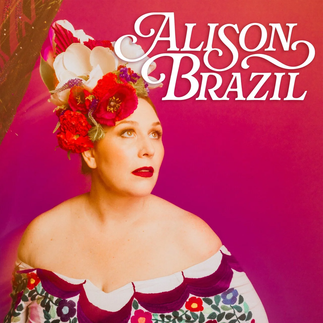 Album cover featuring a woman with flowers in her hair, wearing an embroidered dress with floral patterns. The background is pink, and the text reads 'Alison Brazil' in decorative white script.