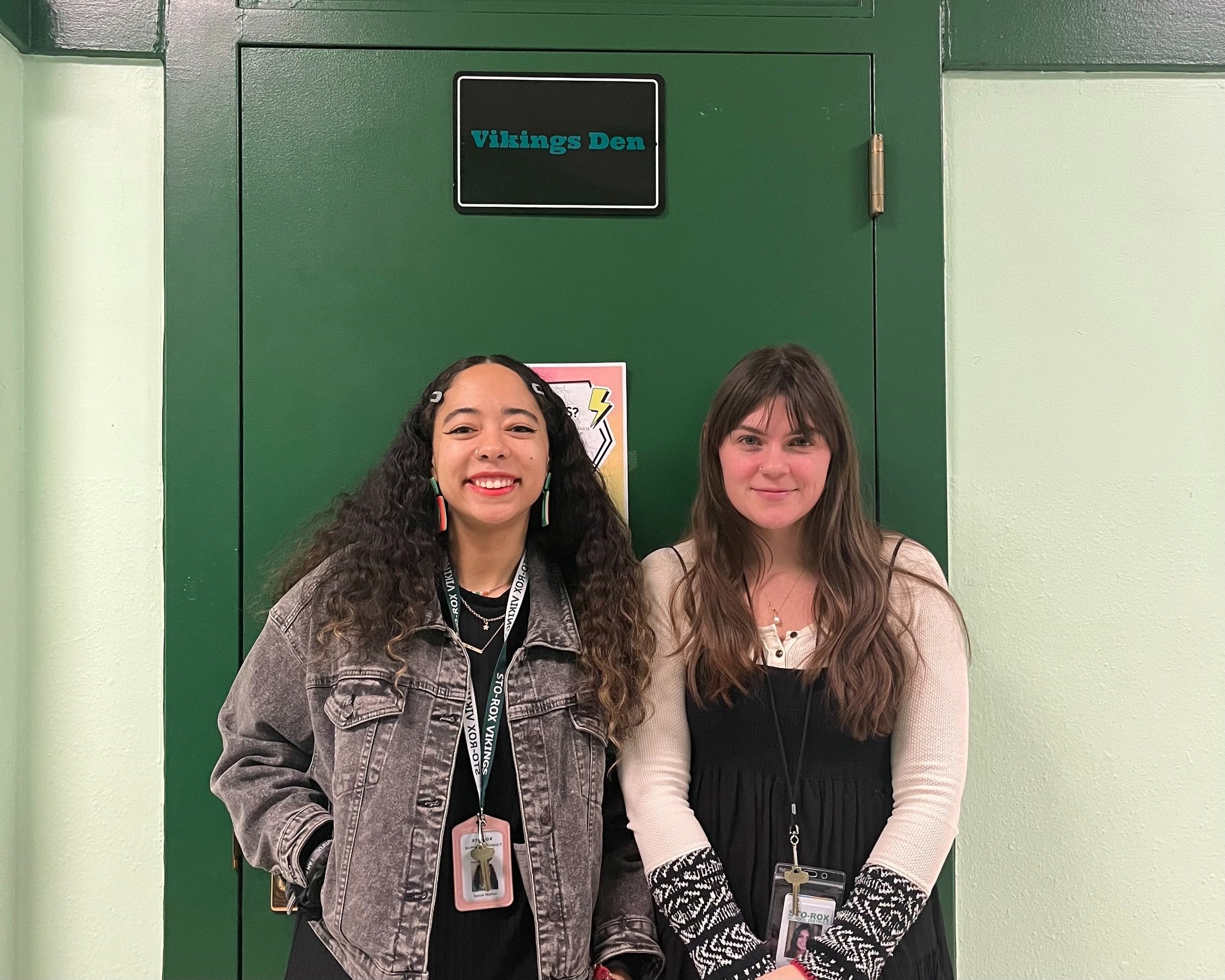  Alexandria Gariepy (L) and Sydney Dominick (R) stand in front of the entrance to the Vikings Den. 