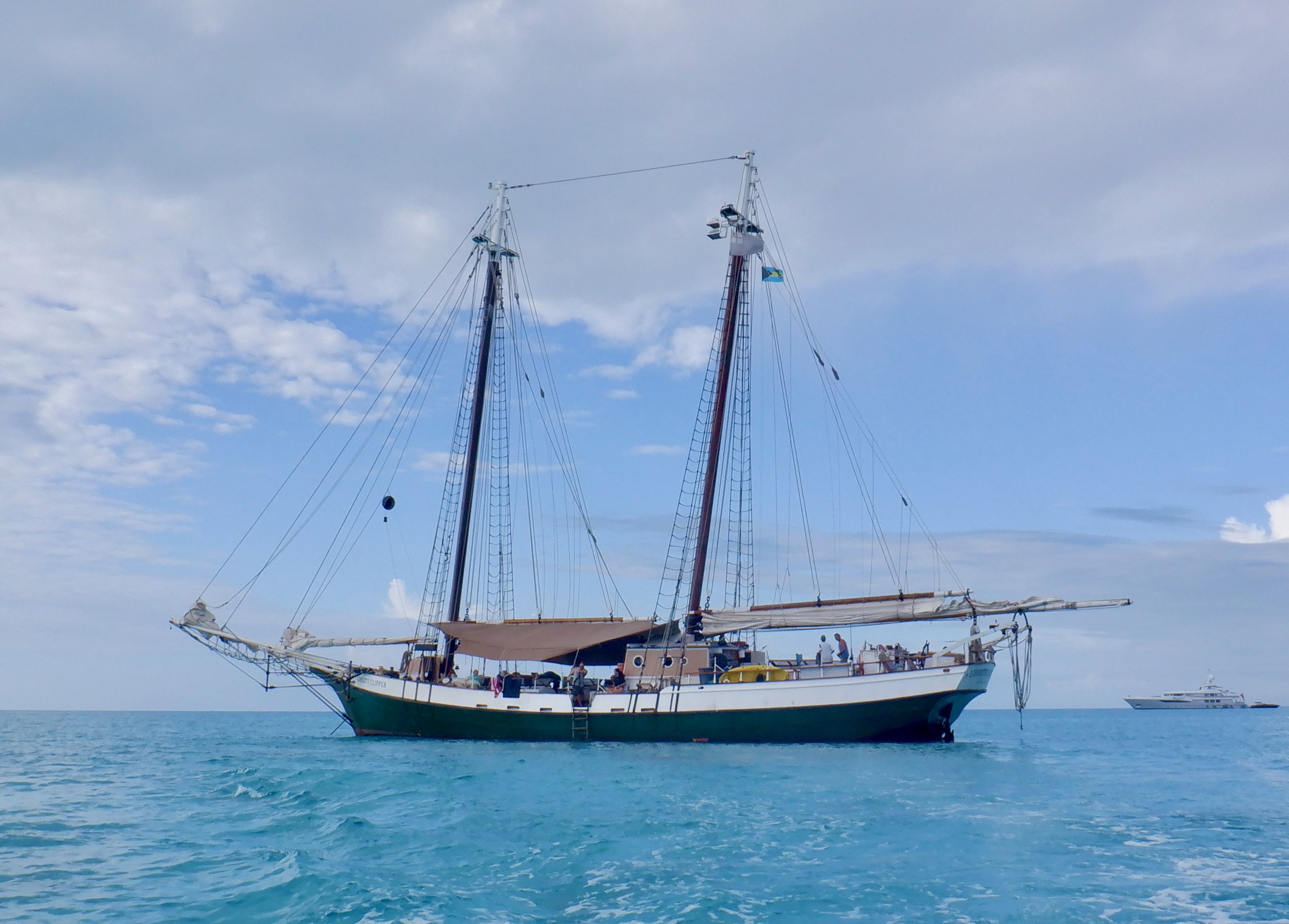 Liberty Clipper is an 1800's era tall ship replica based in Boston out of which she runs tours in the summer, then heads down to the Bahamas for winter season island hopping like this trip.