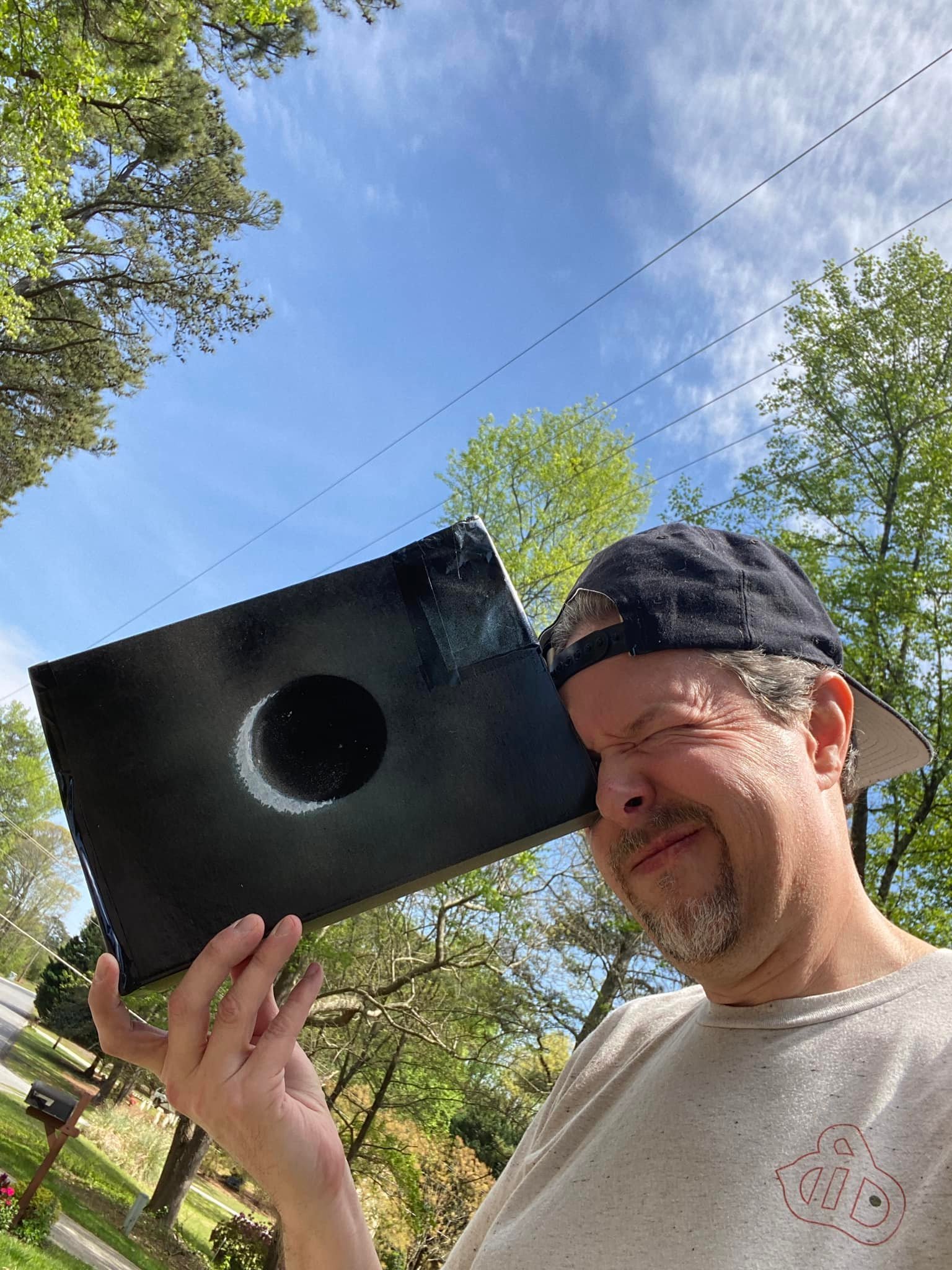 Made a viewer out of a cereal box and spray painted it. Out in my front yard and a few people passed by right at totality to see it too. Viewed through a strainer too. Not as impressive seen as photos though. 

Well that was fun! 

Don&rsquo;t ya jus