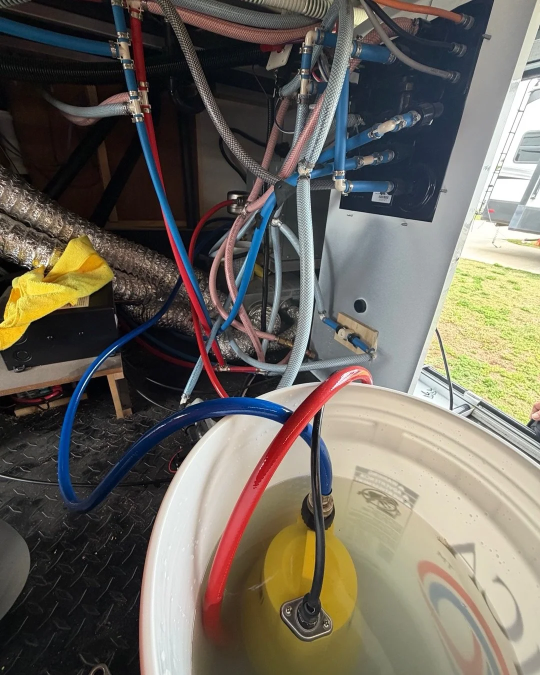 🚿 Tankless Water Heater Descaling: Why It Matters

Most RV owners never see what comes out of a tankless water heater during a descaling service&hellip; and that&rsquo;s exactly why it&rsquo;s so important.

The first photo shows our descaling setup