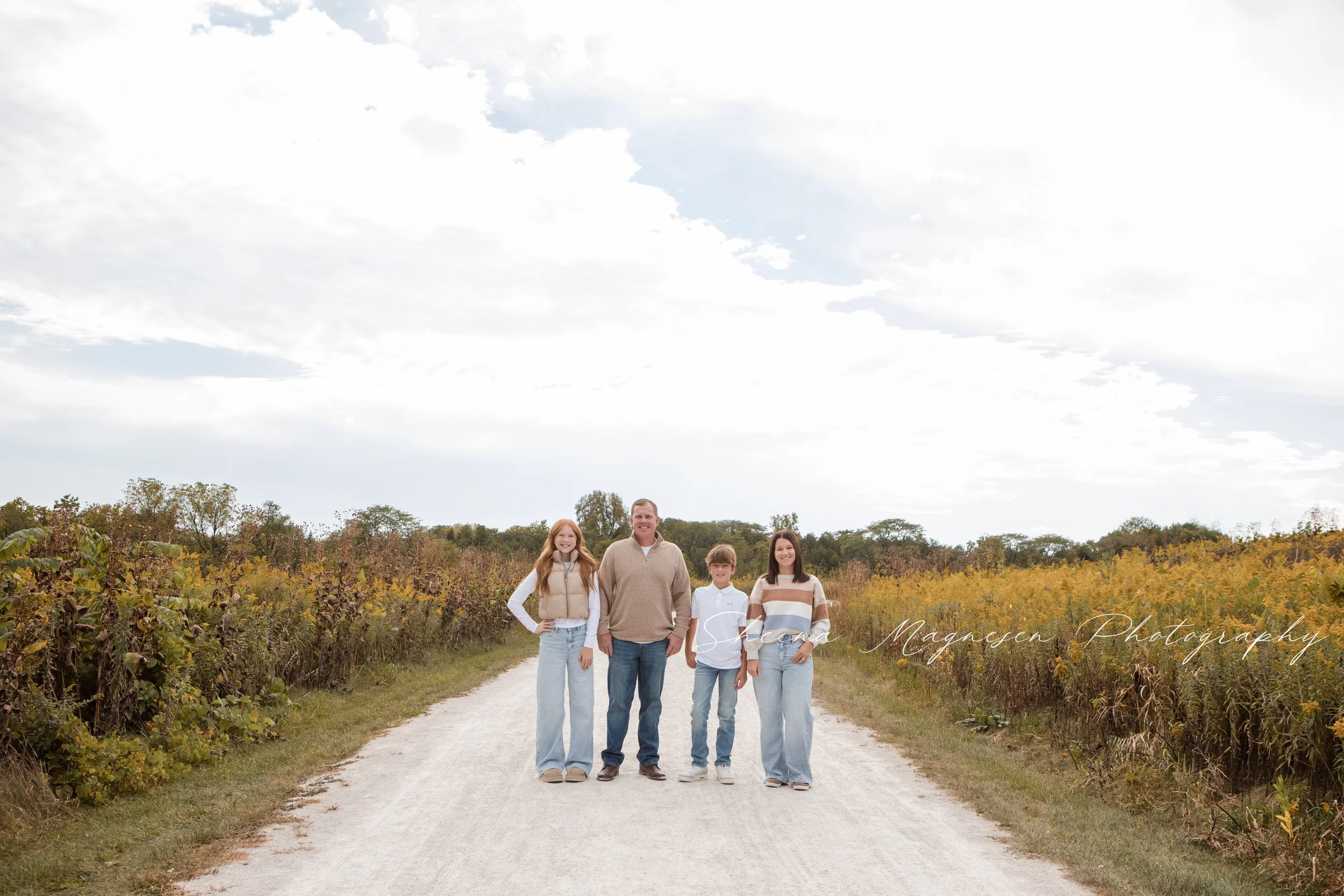 Naperville family photographer captures fall family photos with cozy layered outfits.