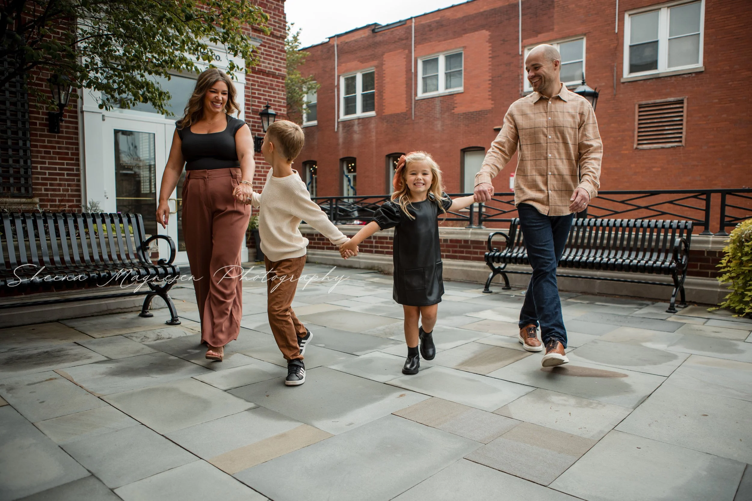Fall family photo outfit details with scarves, hats, and boots