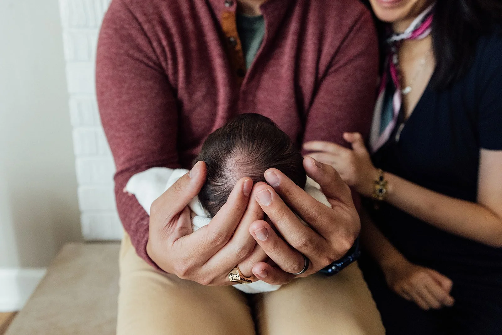 Newborn baby resting peacefully at home during lifestyle newborn session in Naperville, Illinois.