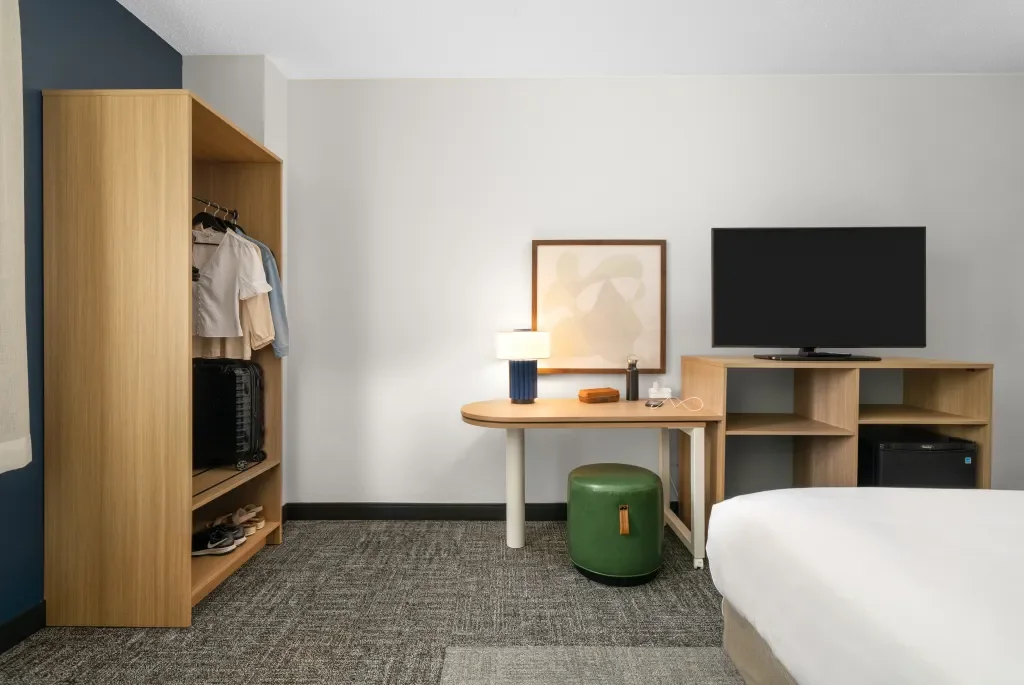 Spark-by-Hilton-Guest-Room-Adjustable-Work-Station-Closet-1.webp