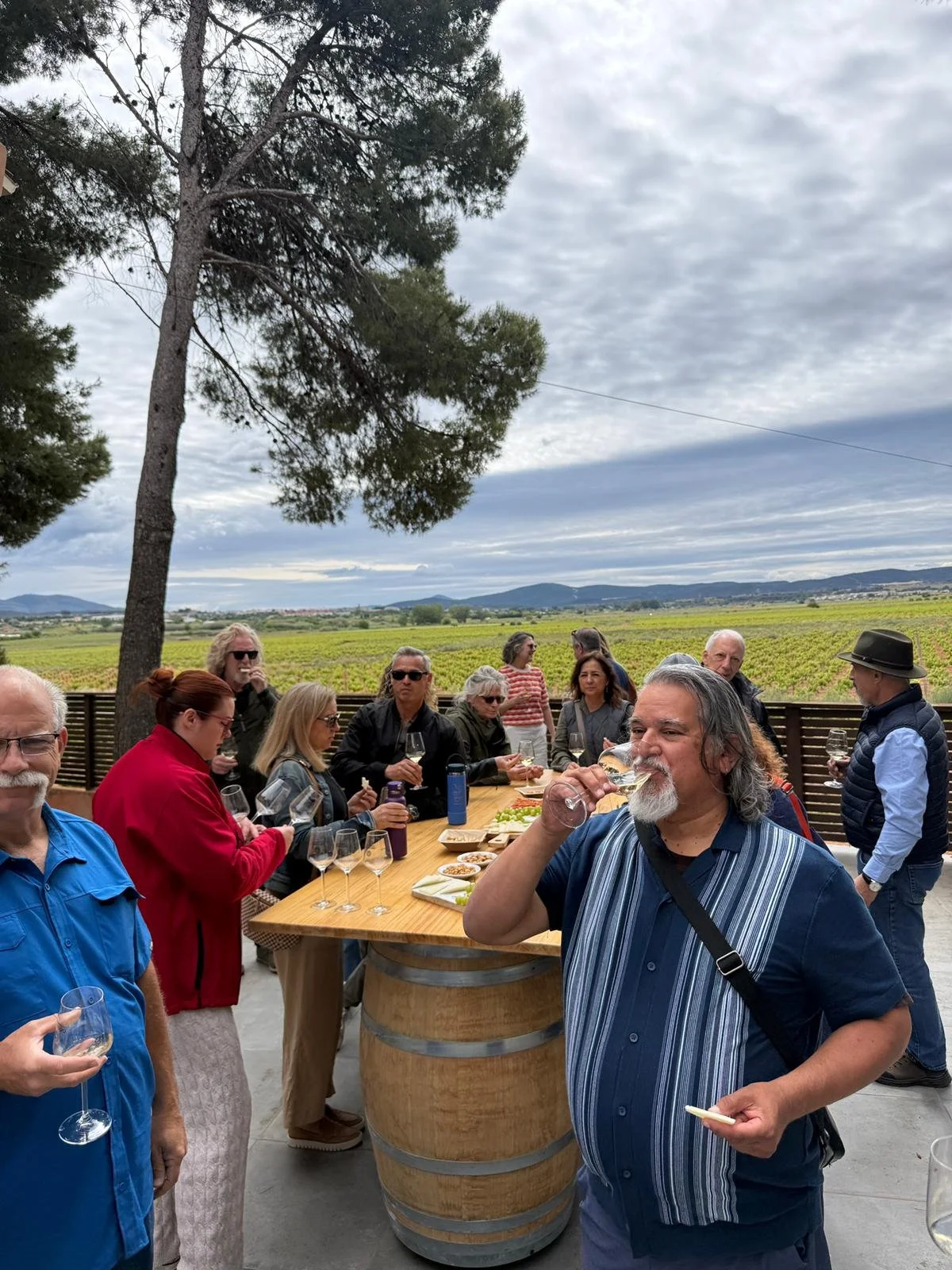 Encantada World expat social event in Requena, Spain — clients enjoying a day of wine tasting and local cuisine.