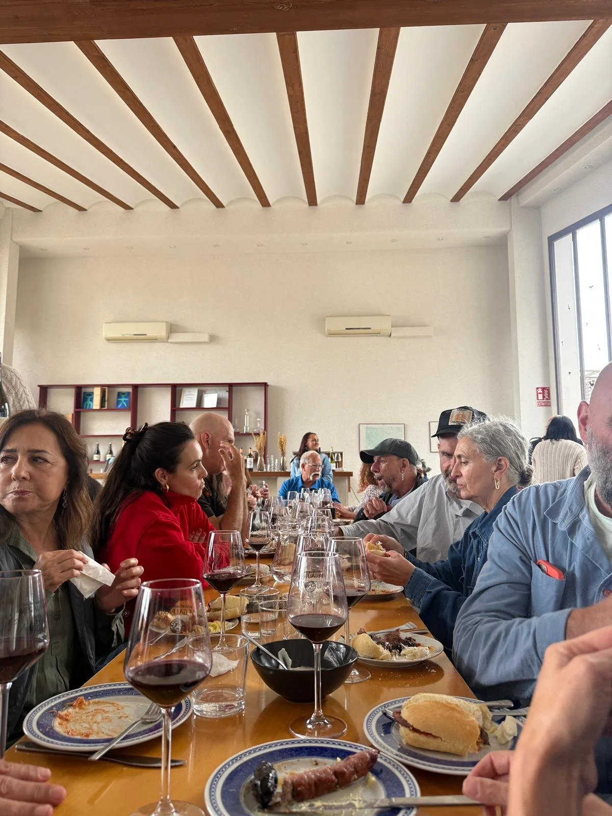 Encantada World expat social event in Requena, Spain — clients enjoying a day of wine tasting and local cuisine.