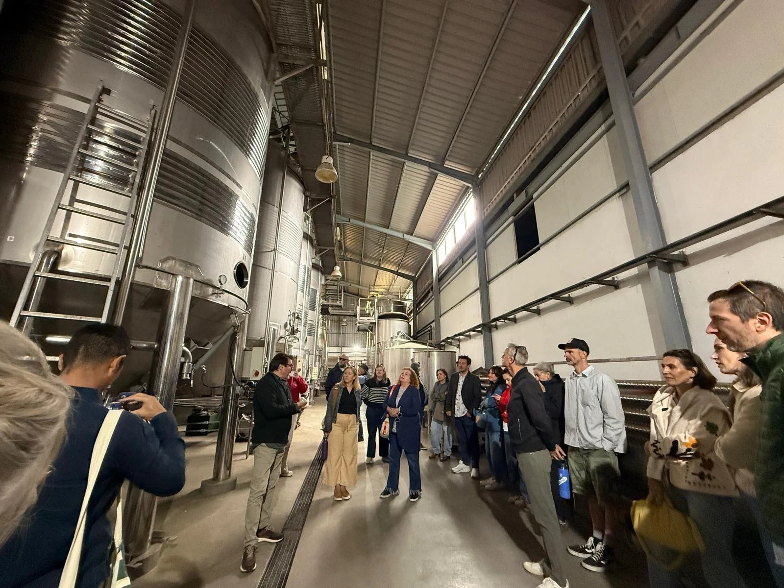 Encantada World expat social event in Requena, Spain — clients enjoying a day of wine tasting and local cuisine.