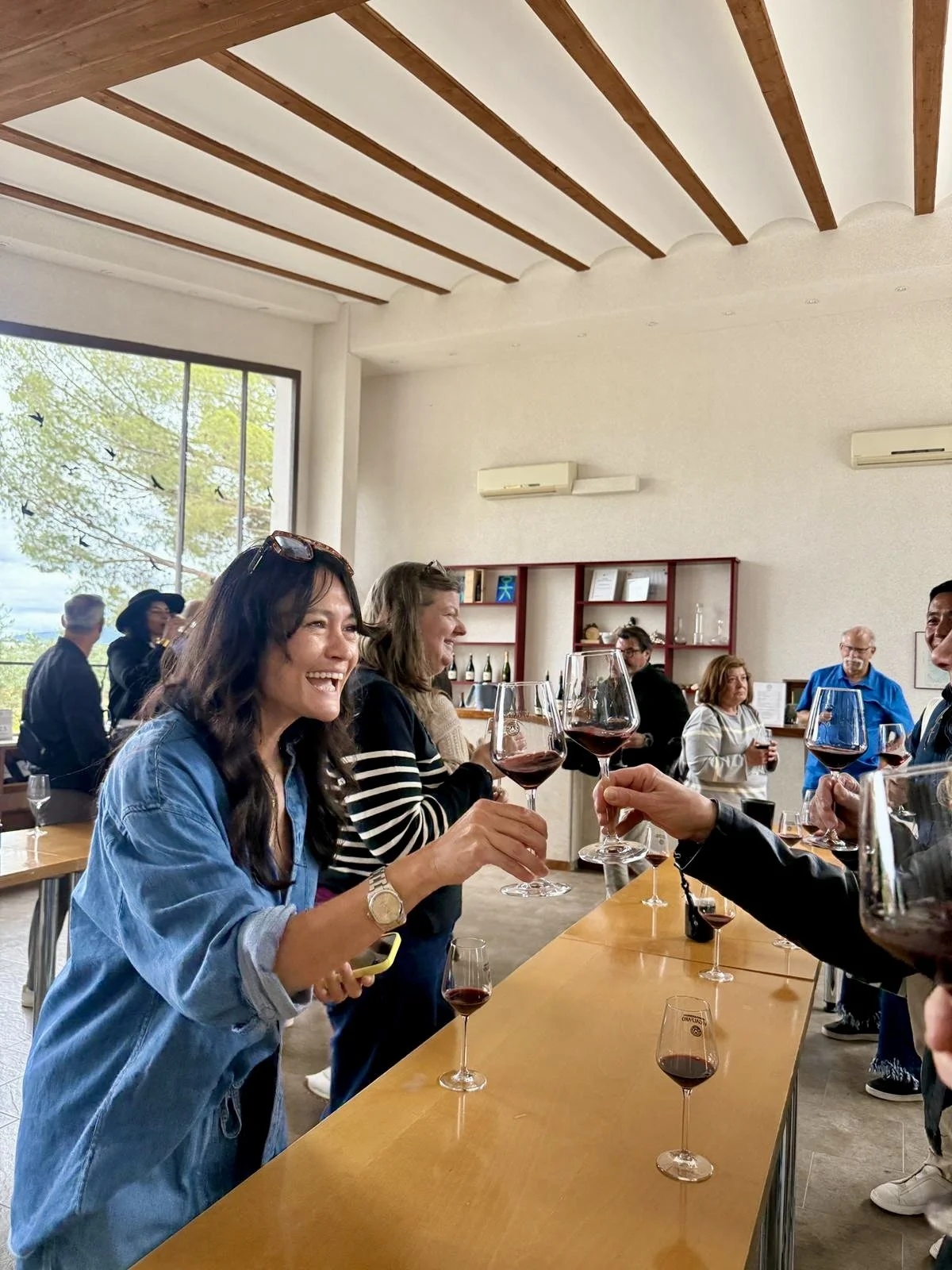 Encantada World expat social event in Requena, Spain — clients enjoying a day of wine tasting and local cuisine.